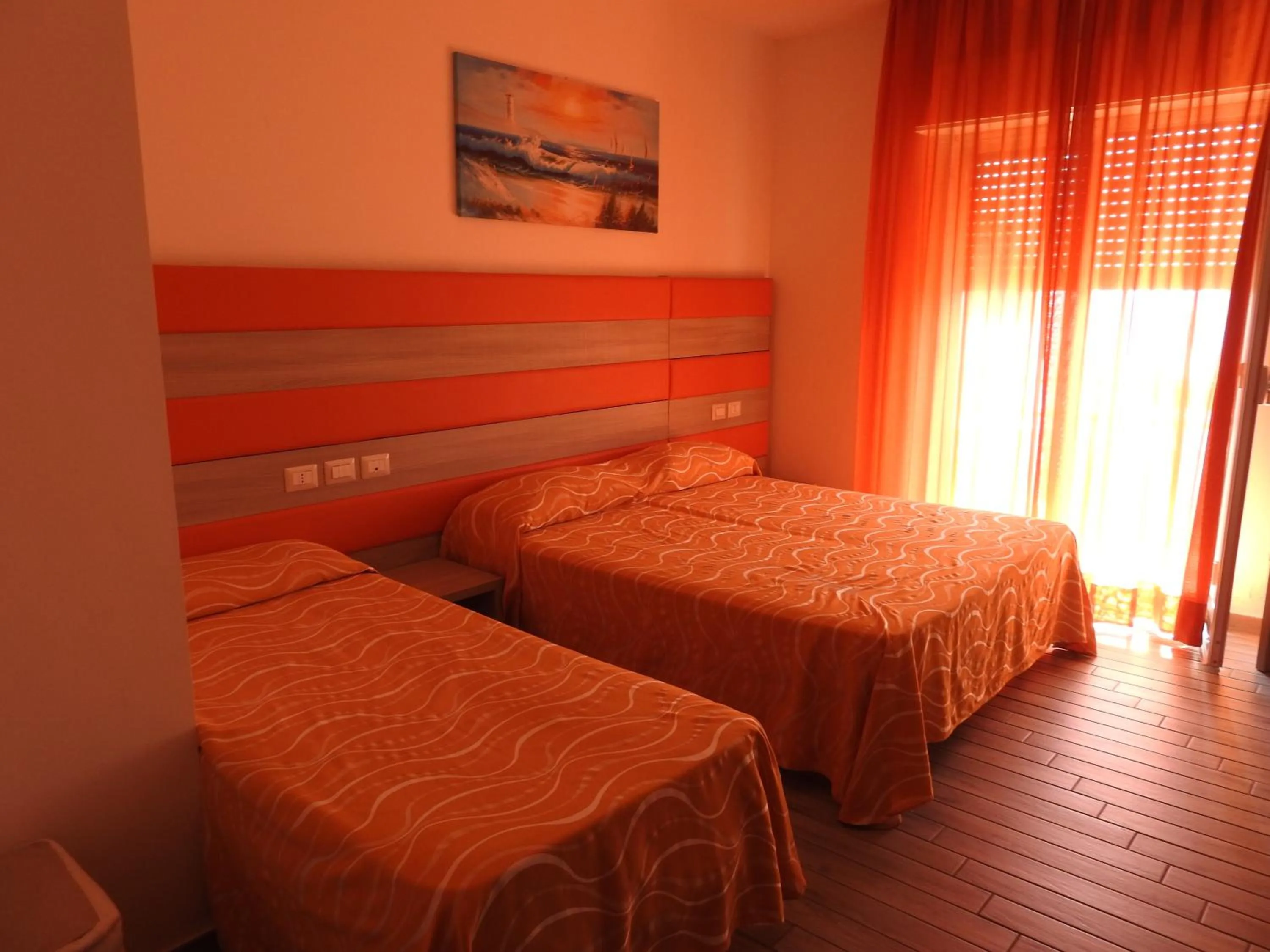 Bed in ChrisMare Hotel