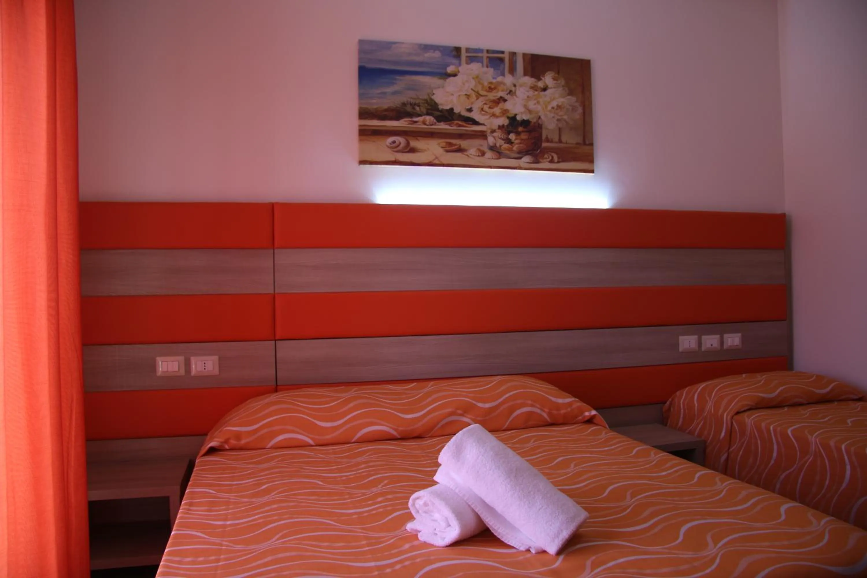 Bed in ChrisMare Hotel