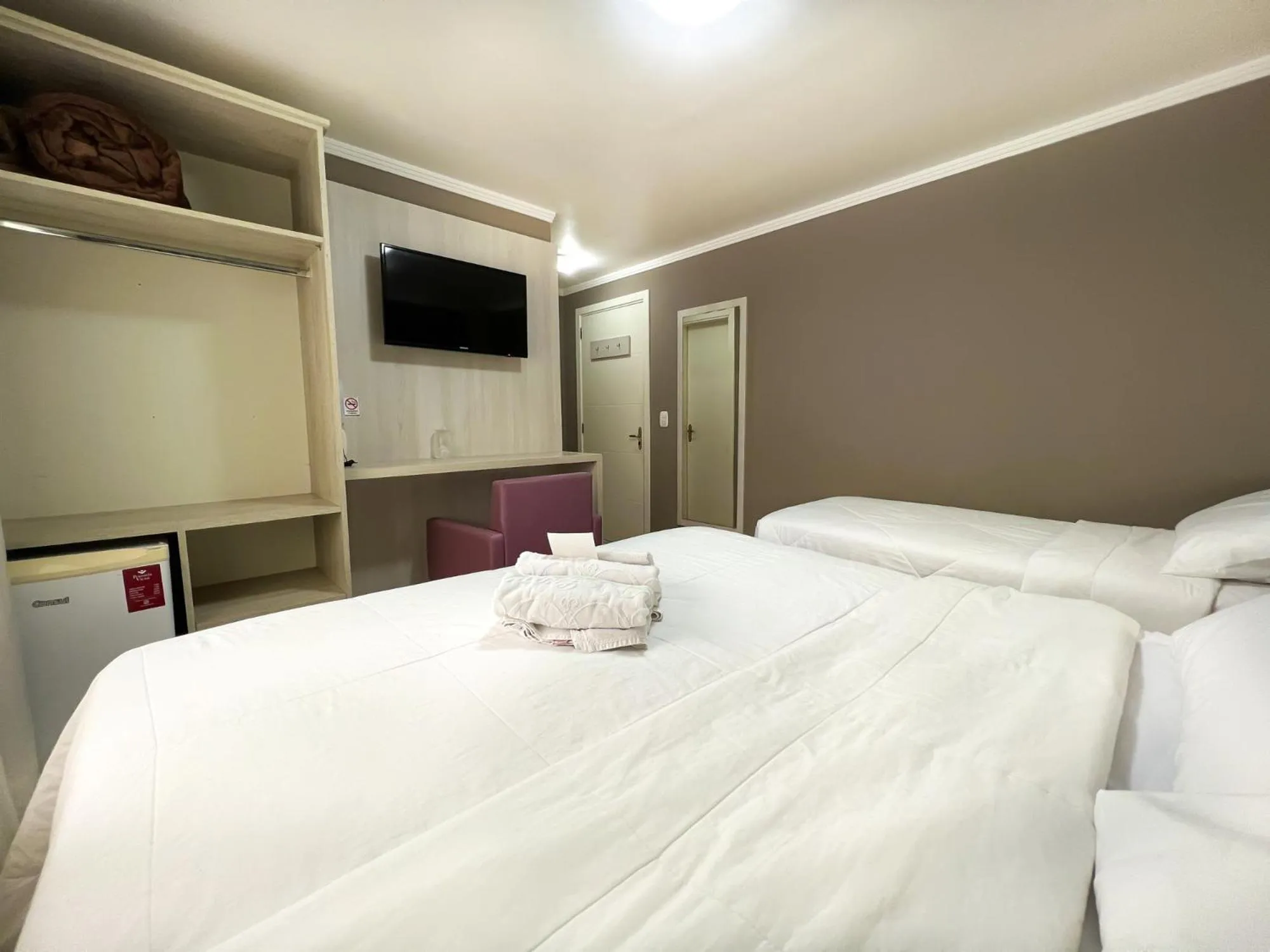 Bed in Pousada Viena