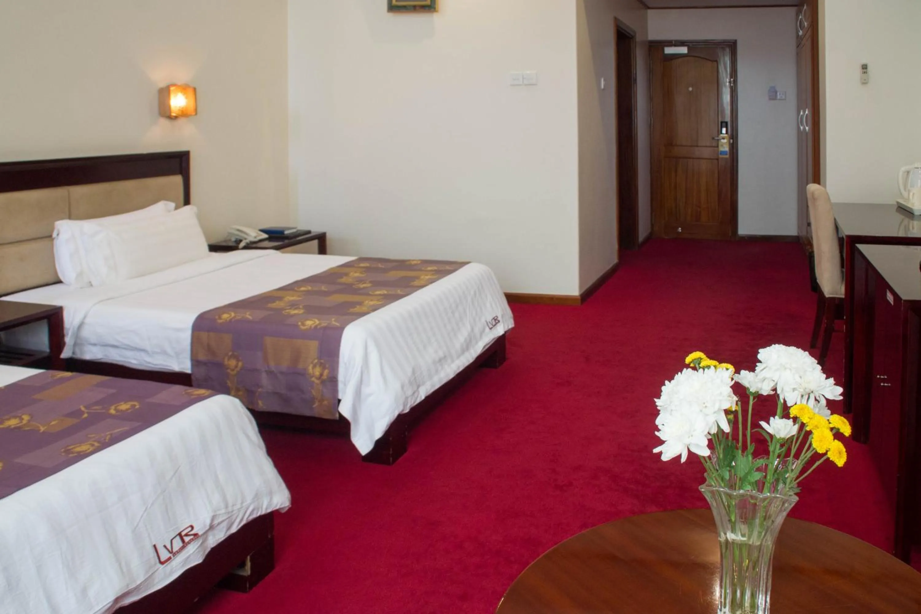 Bed in Lake View Resort Hotel