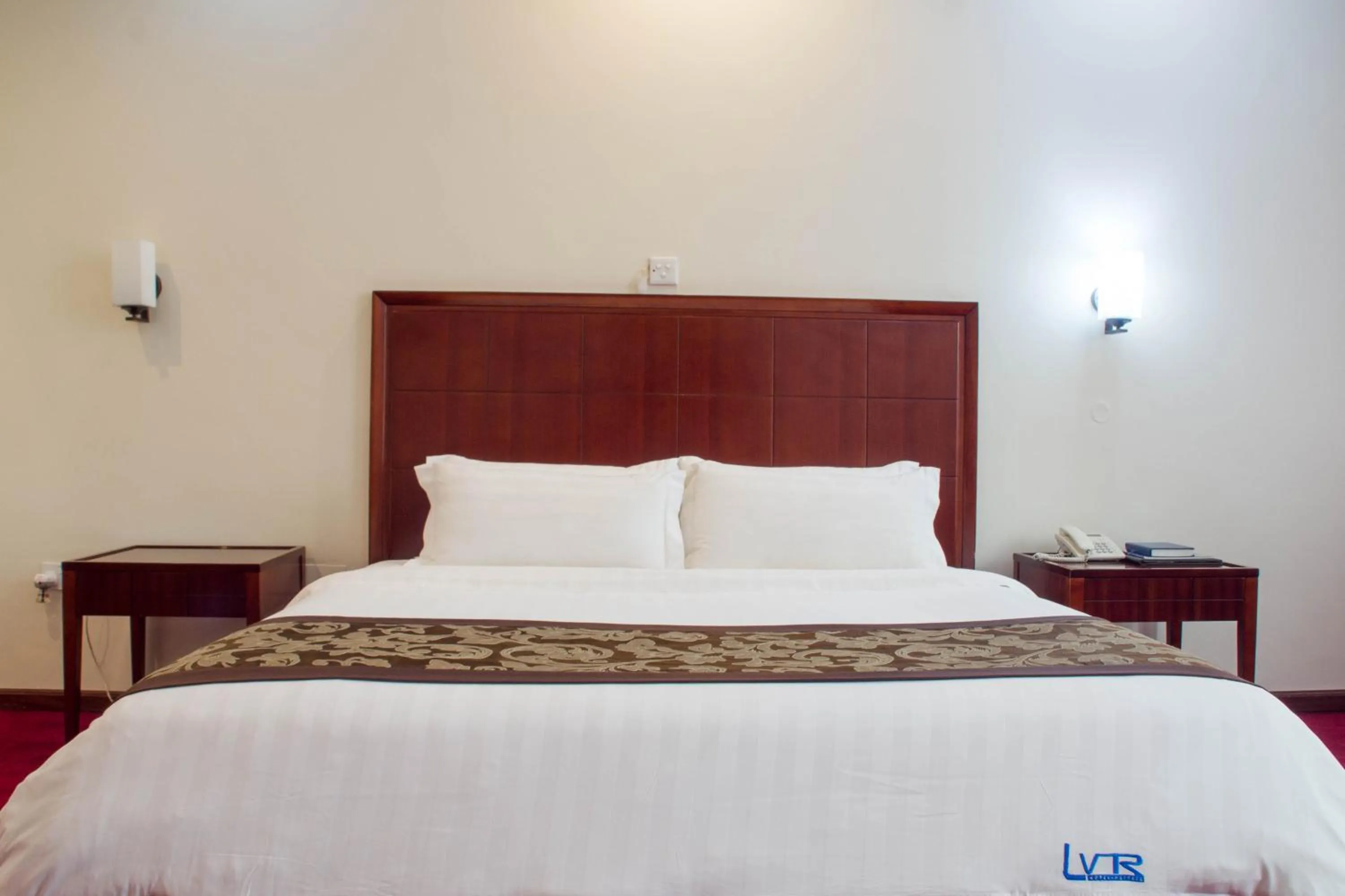 Bed in Lake View Resort Hotel