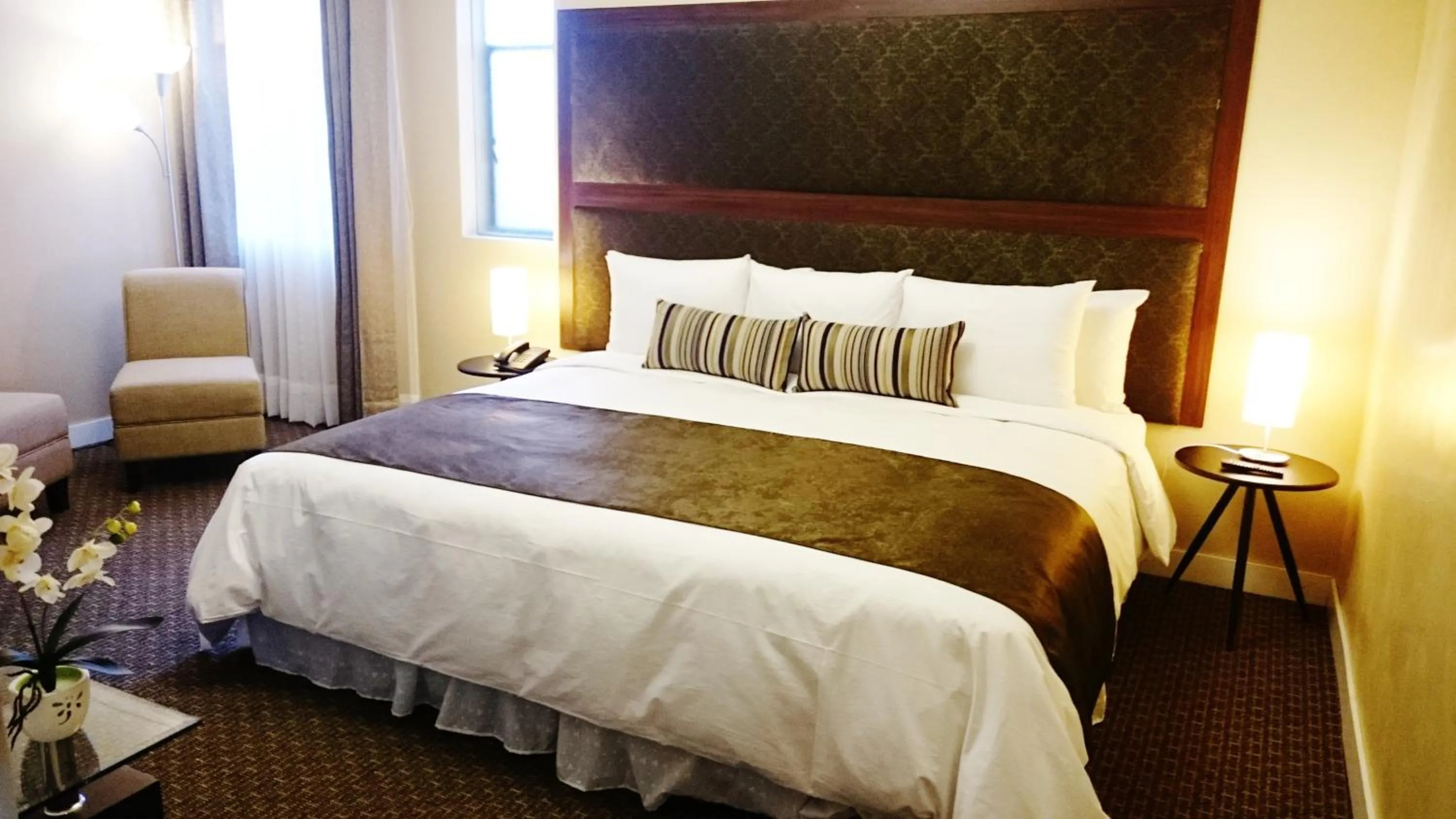 Bed in Los Leones Hotel Boutique
