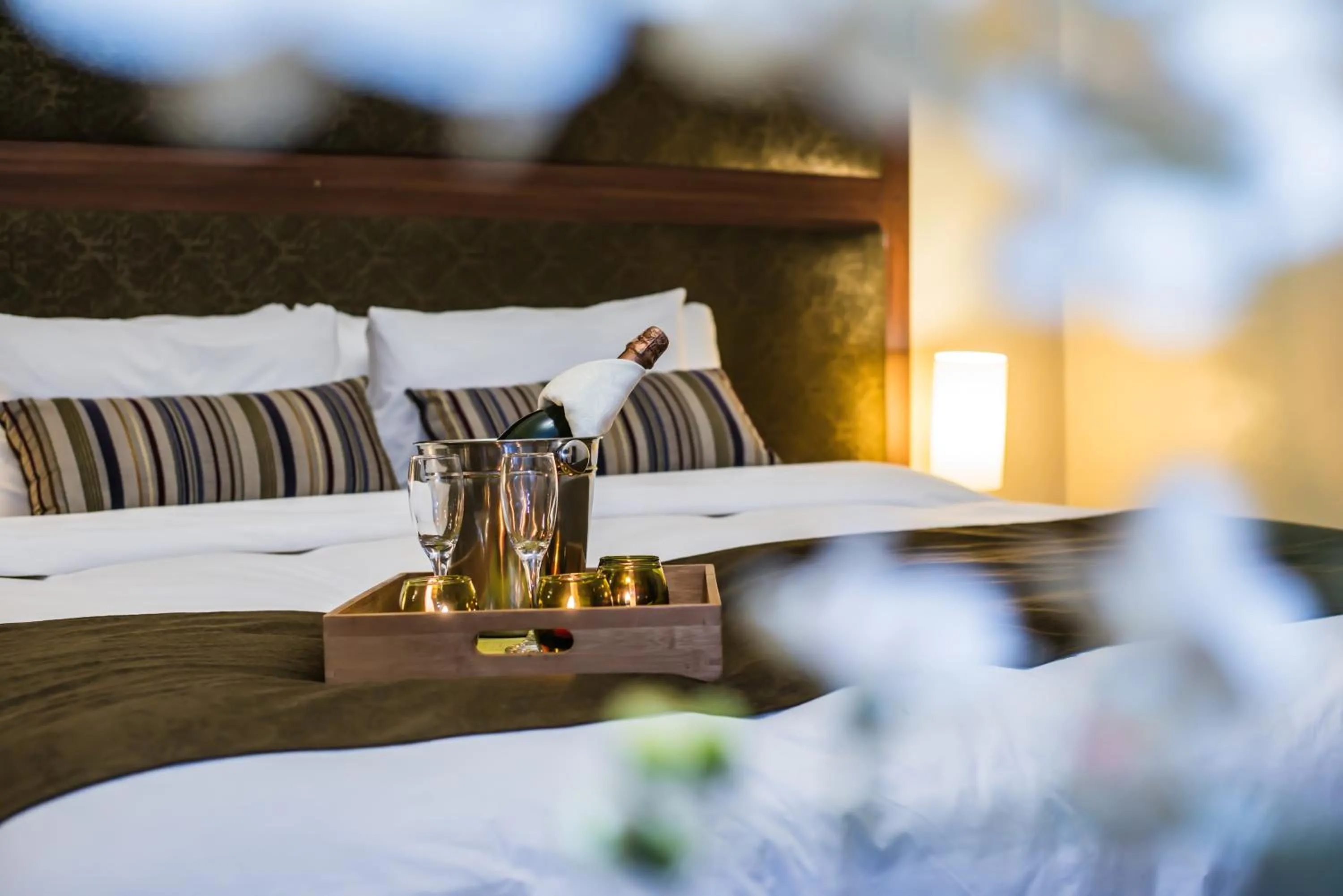 Bed in Los Leones Hotel Boutique