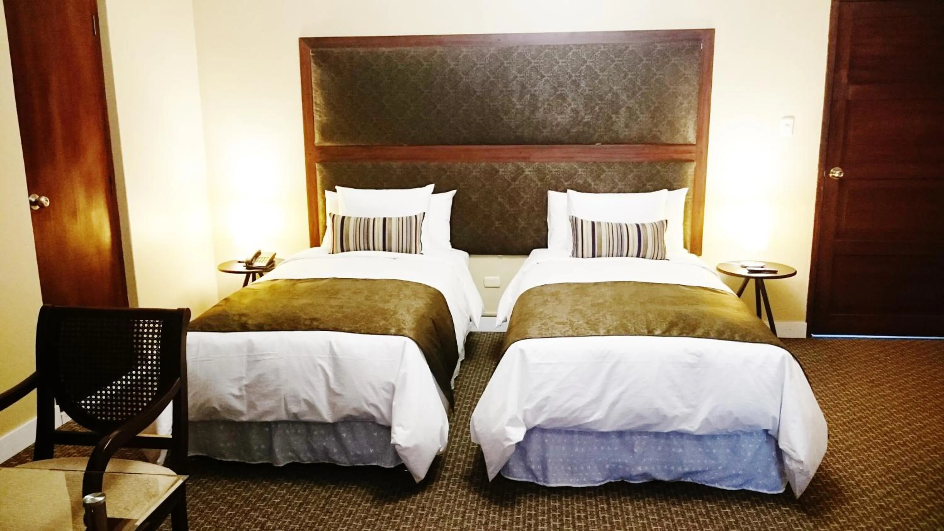 Bed in Los Leones Hotel Boutique