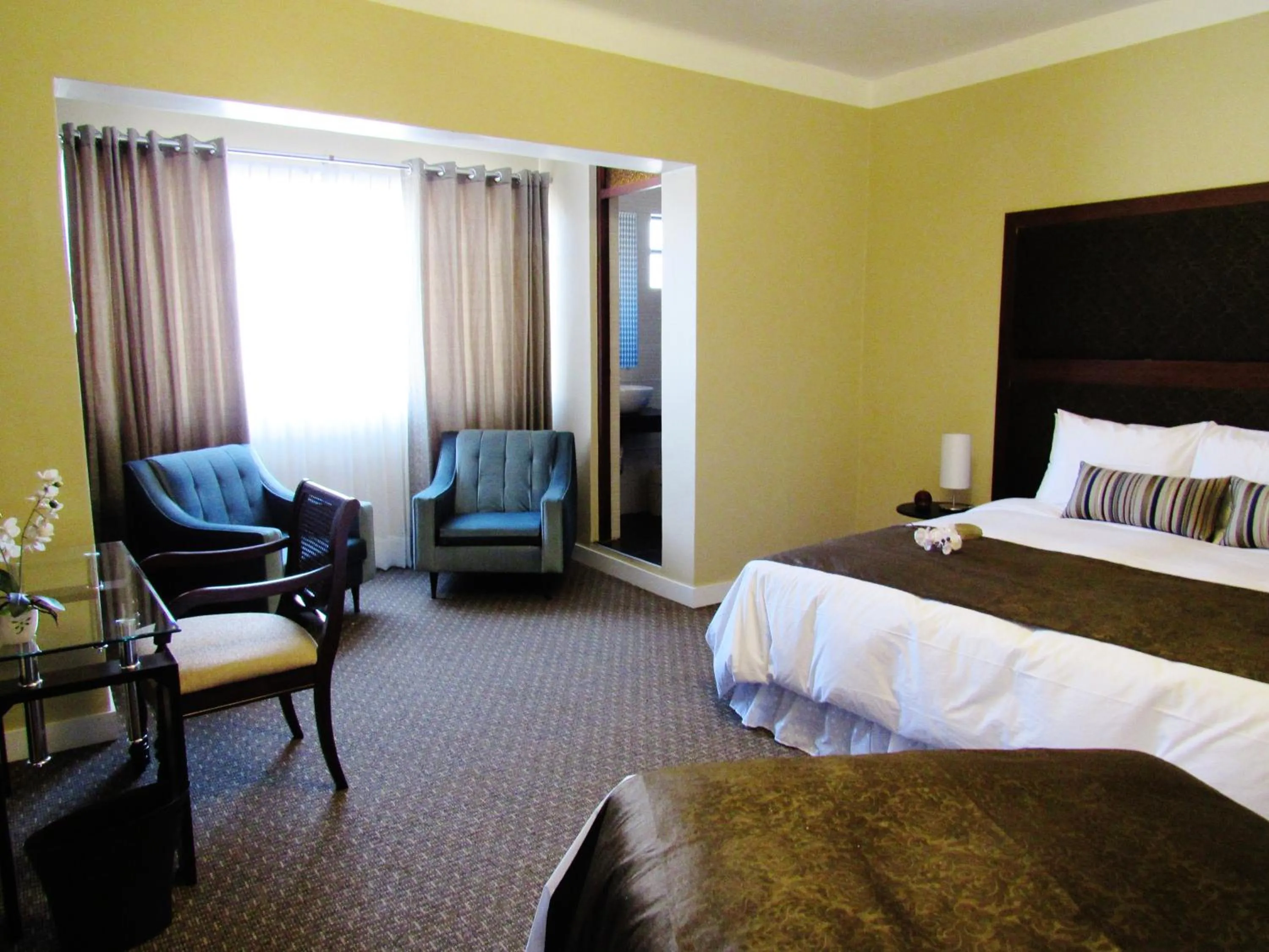 Bathroom, Bed in Los Leones Hotel Boutique