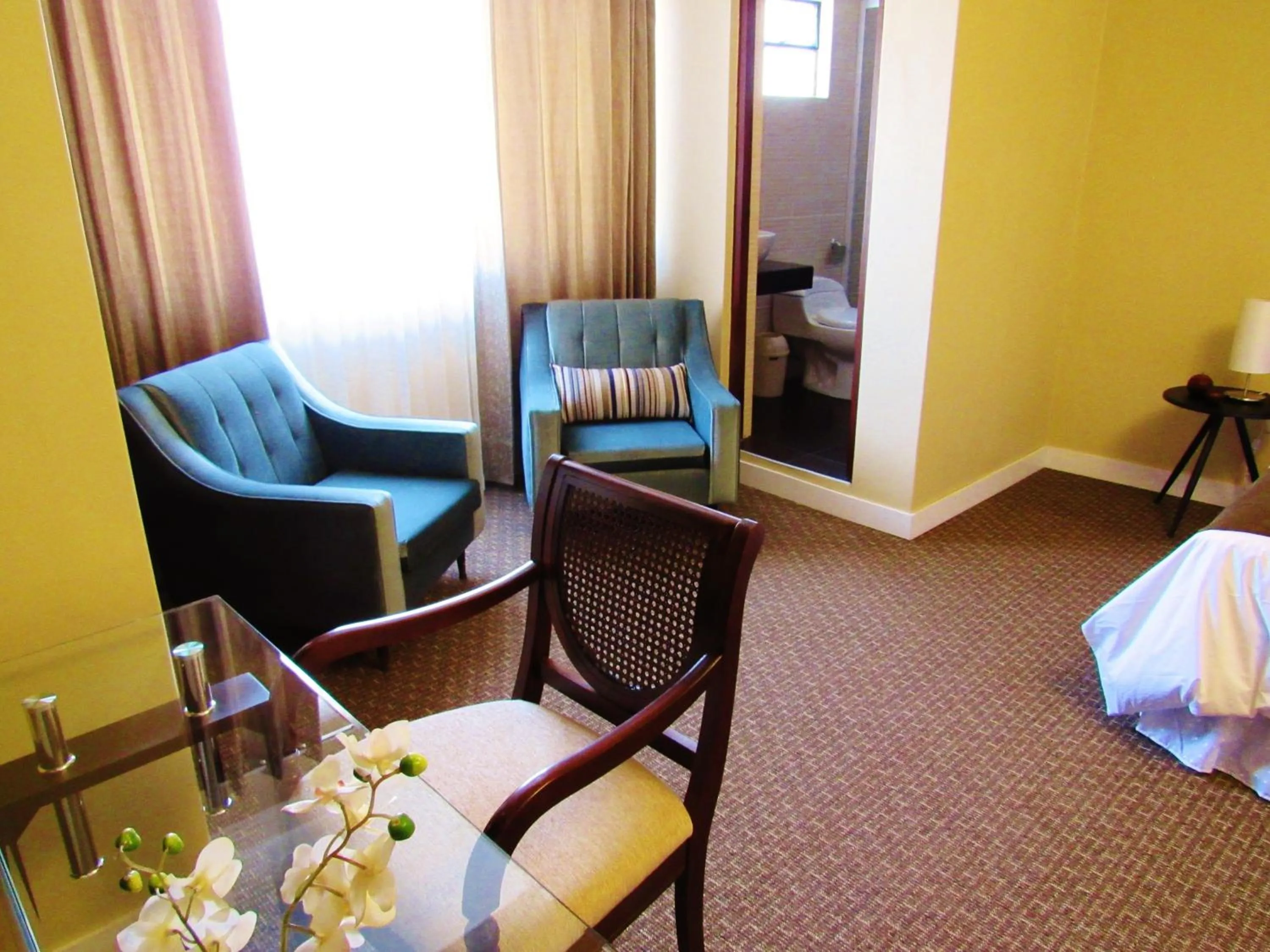 Bed in Los Leones Hotel Boutique