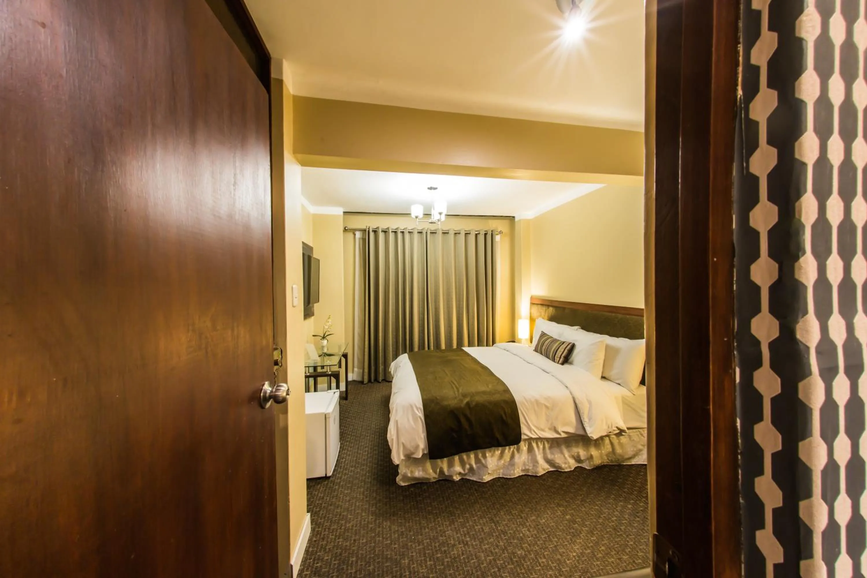 Bed in Los Leones Hotel Boutique
