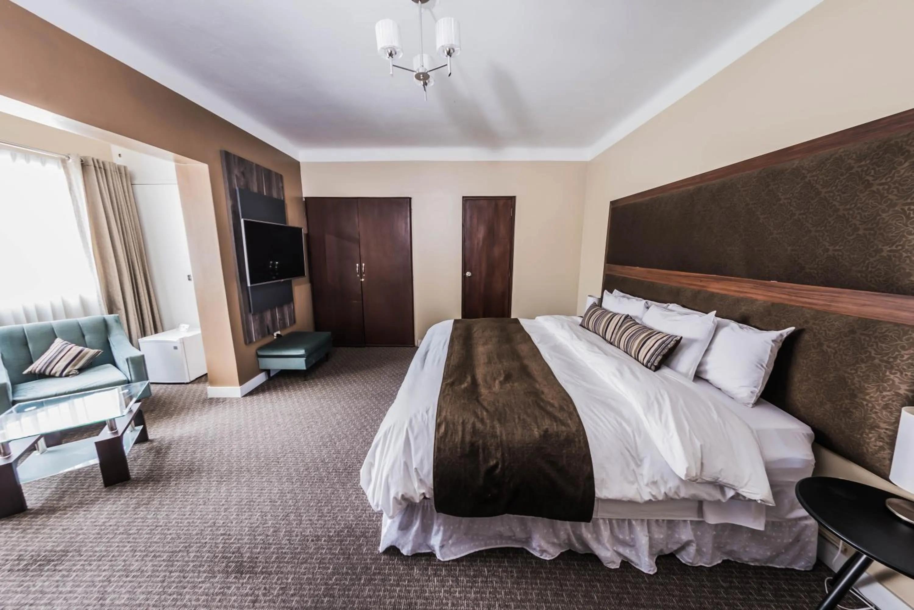 Bed in Los Leones Hotel Boutique