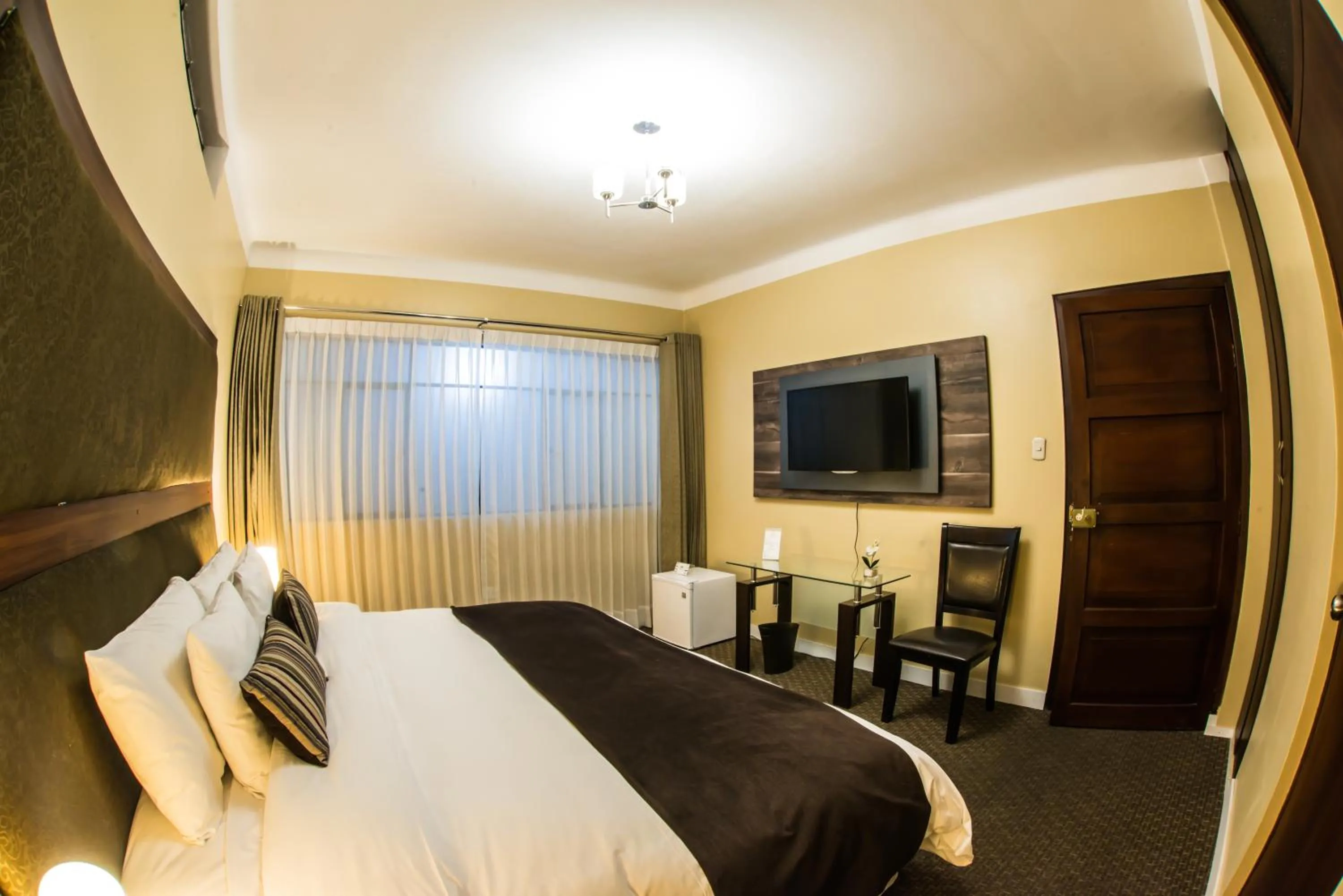 Bed in Los Leones Hotel Boutique