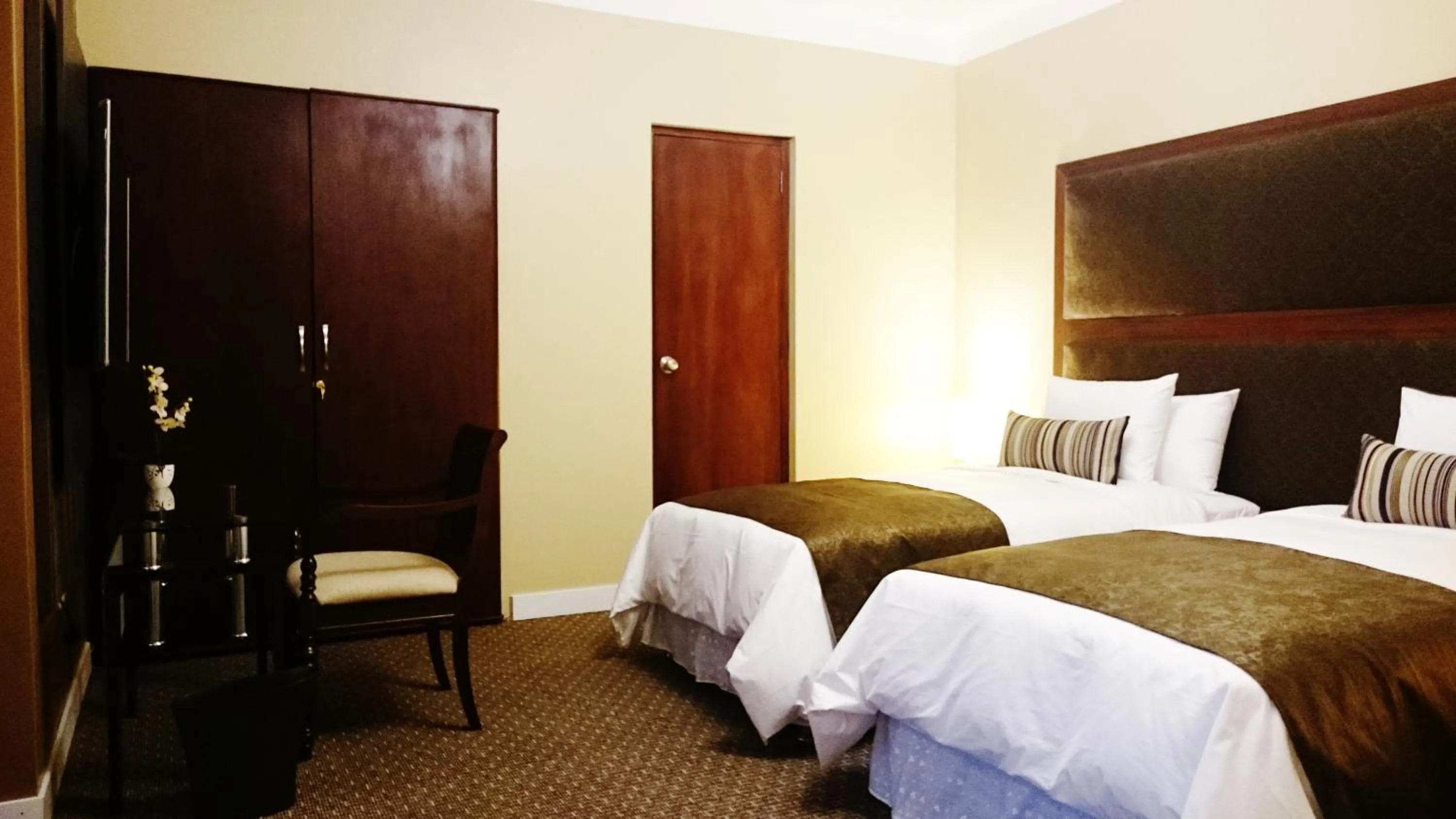 Bed in Los Leones Hotel Boutique