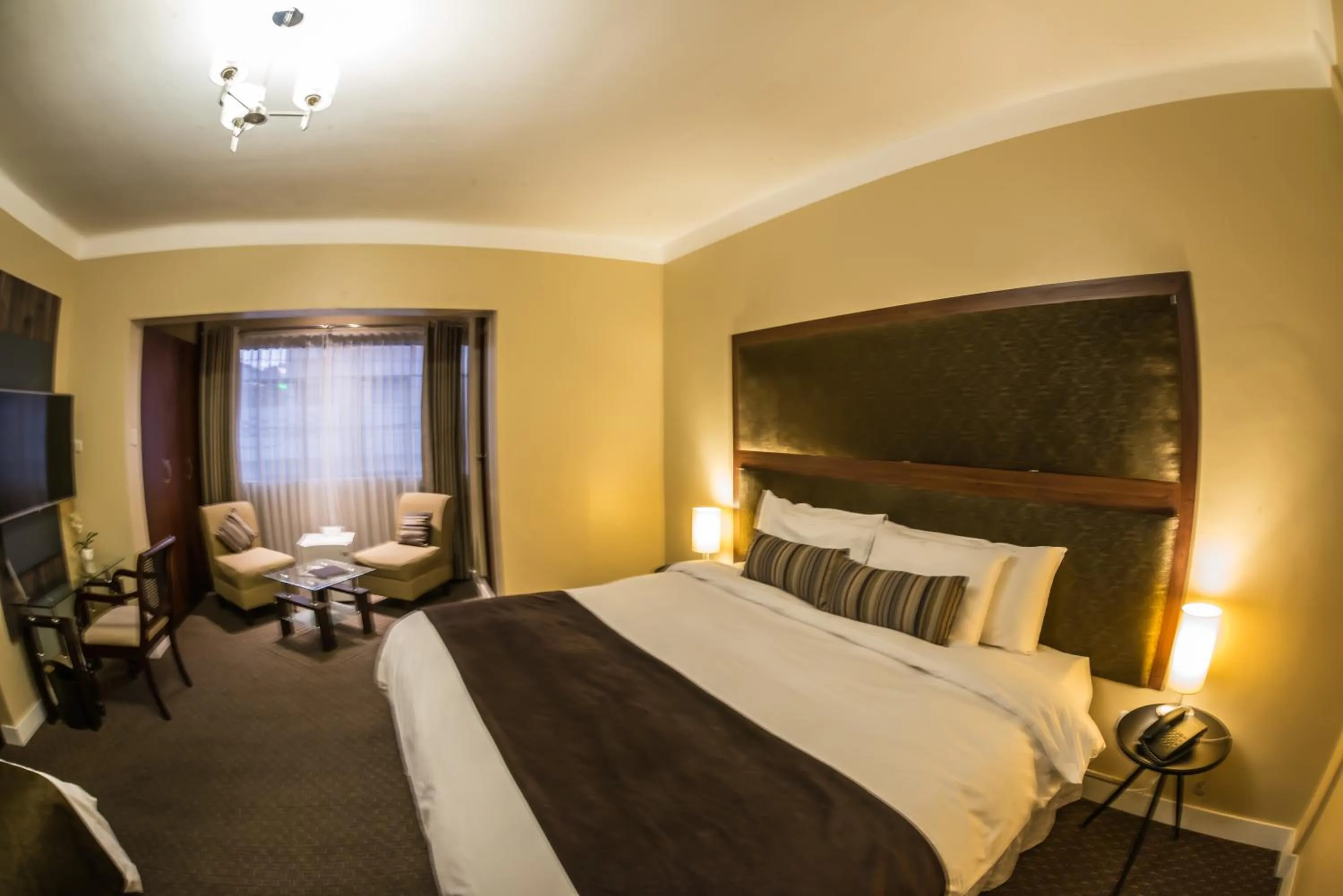 Bed in Los Leones Hotel Boutique
