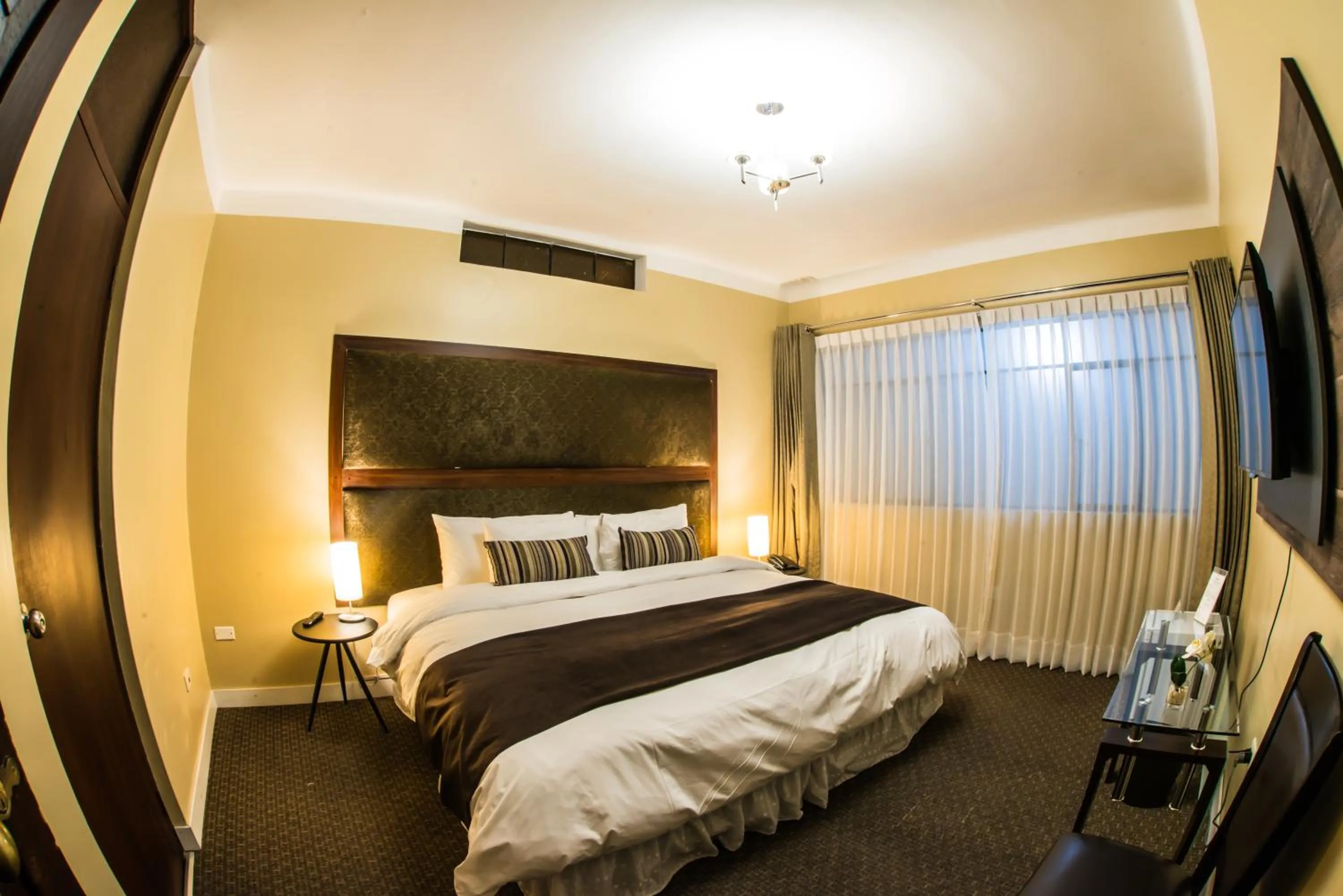 Bed in Los Leones Hotel Boutique