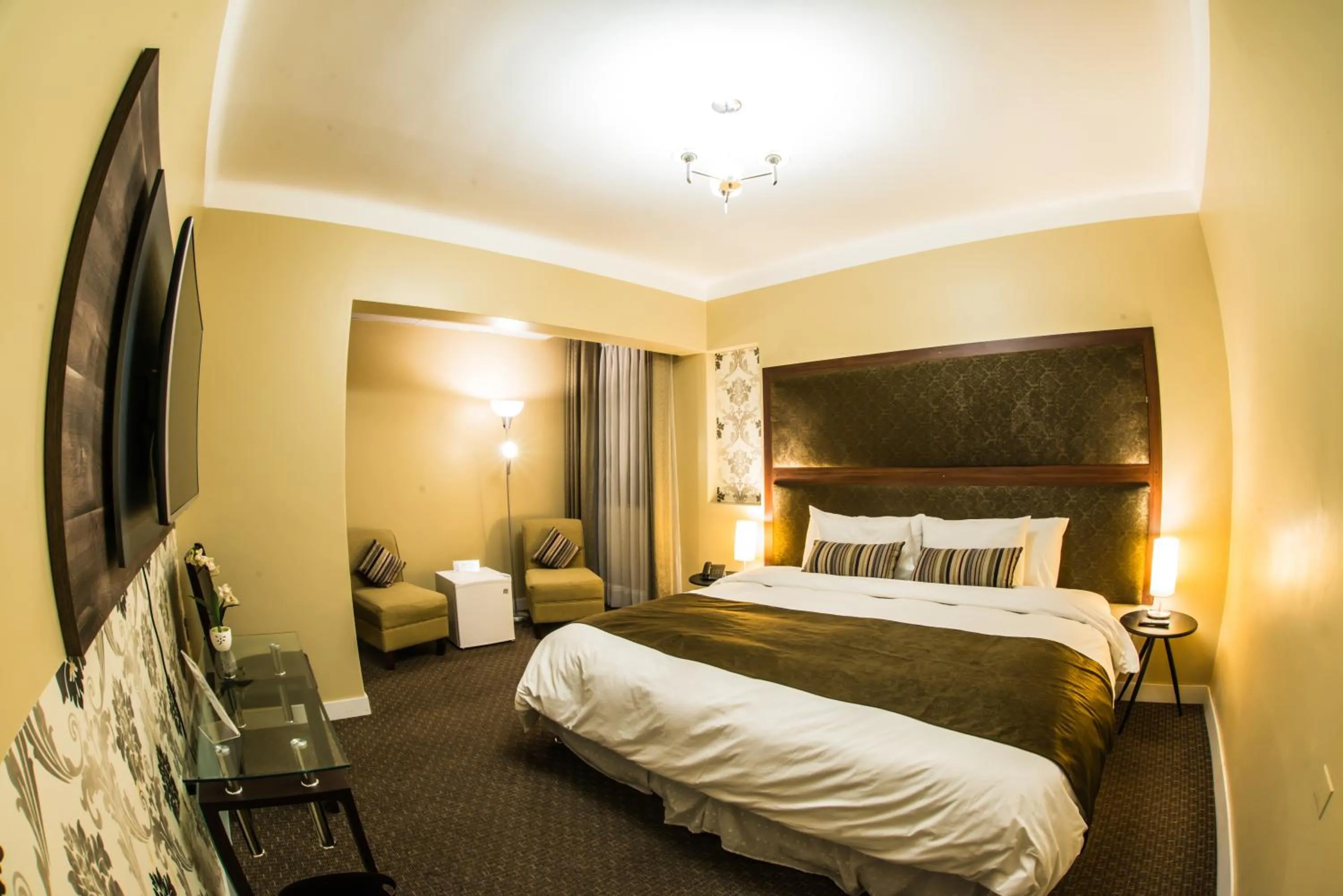 Bed in Los Leones Hotel Boutique