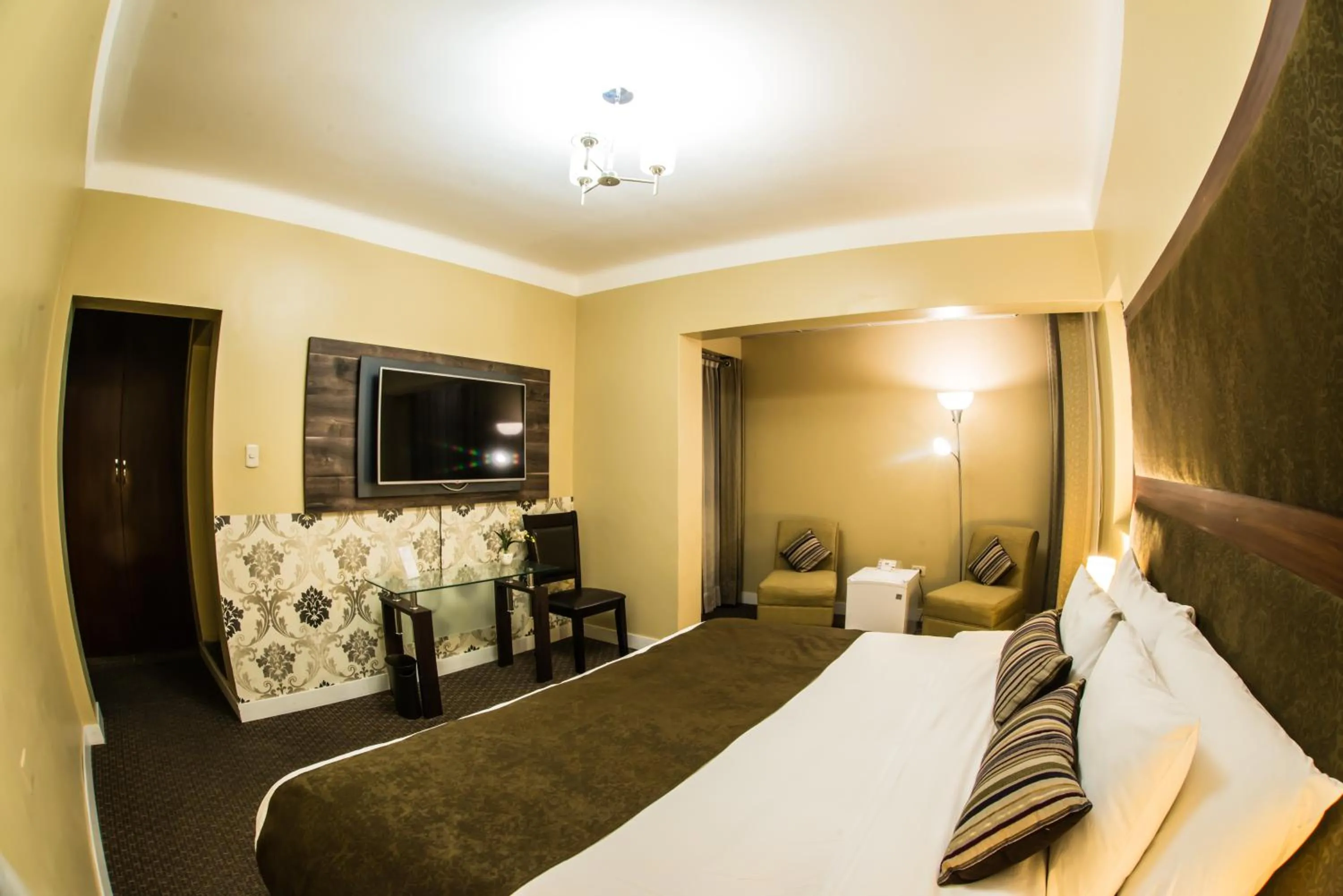 Bed in Los Leones Hotel Boutique
