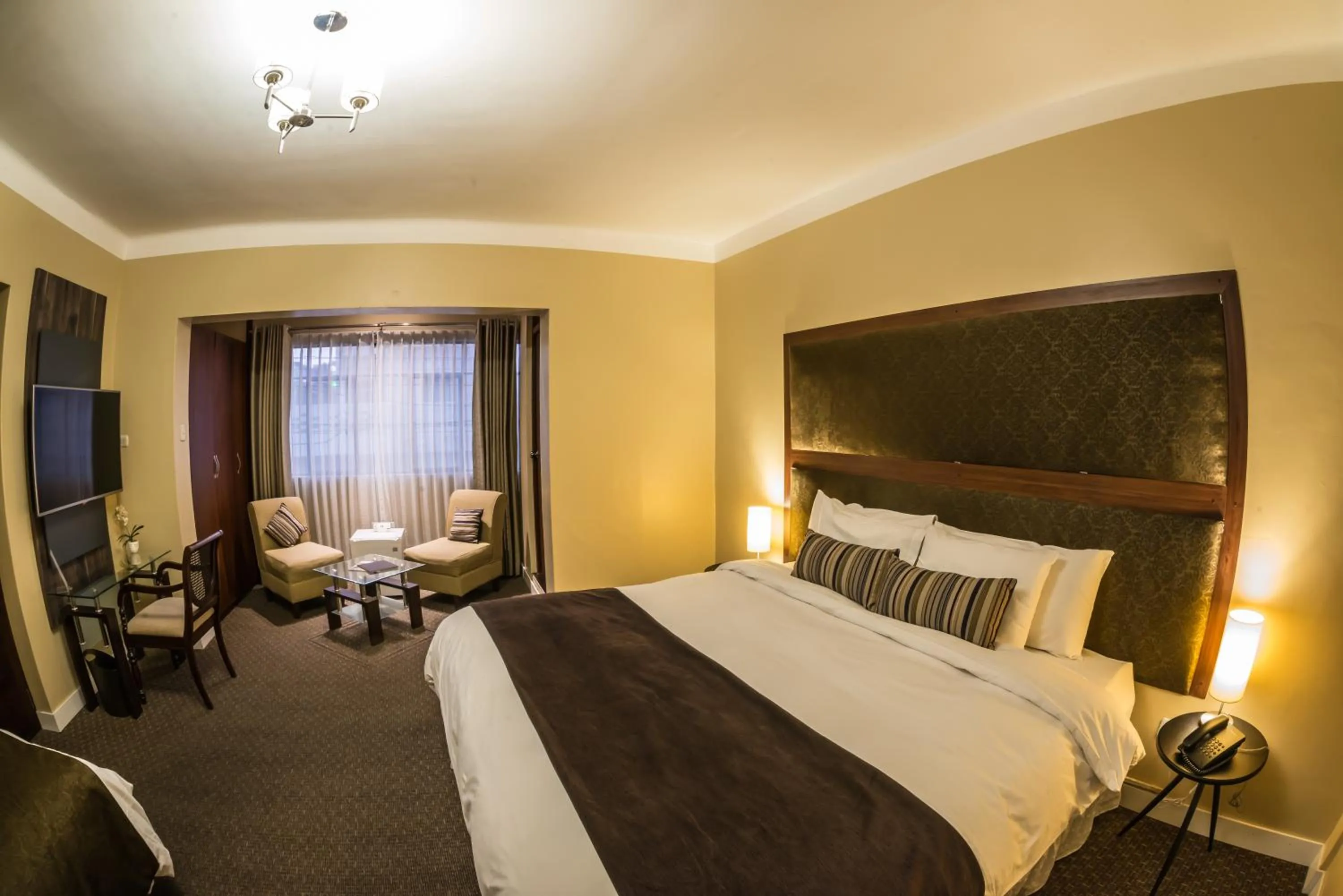 Bed in Los Leones Hotel Boutique