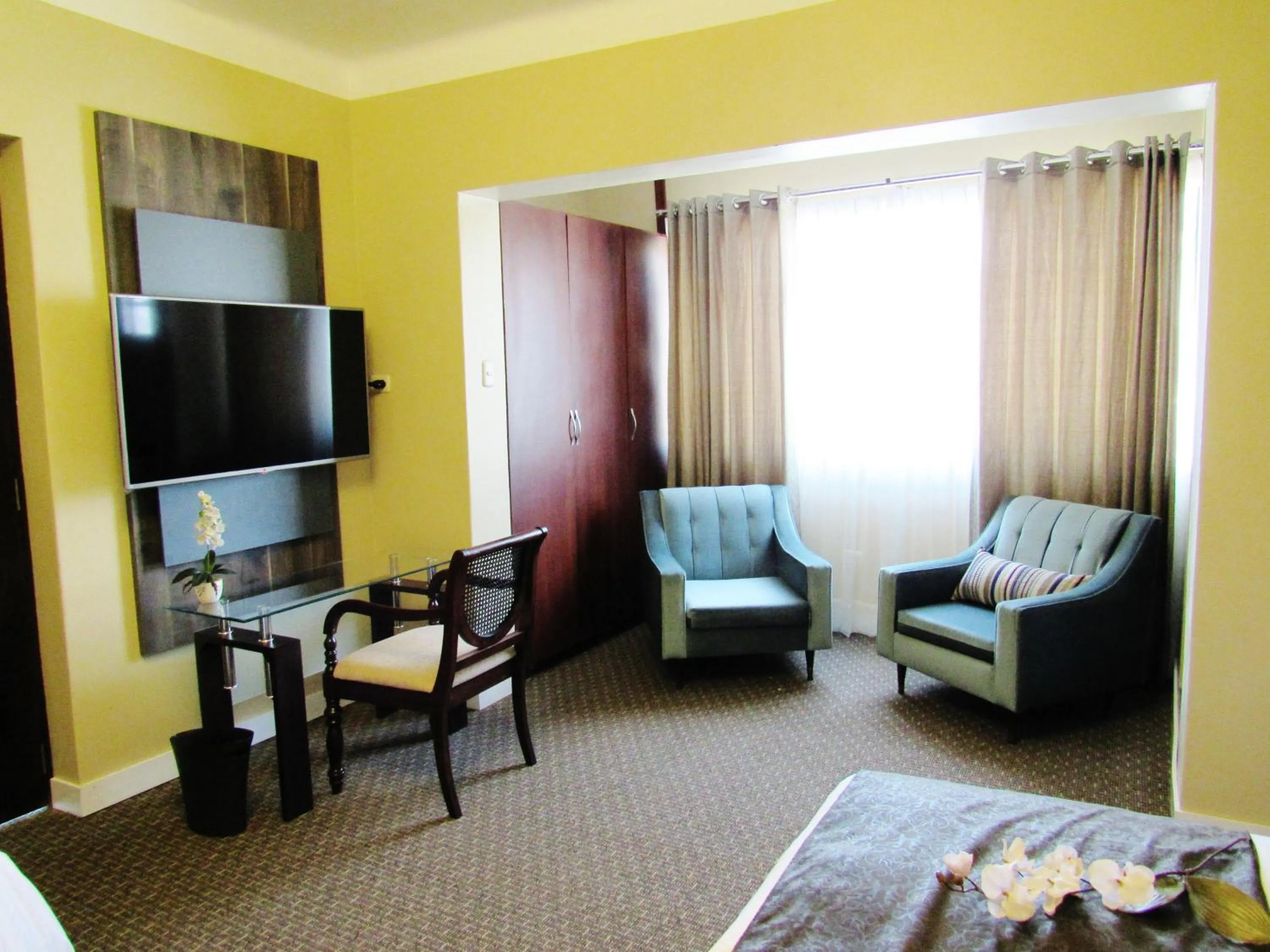 Bed in Los Leones Hotel Boutique
