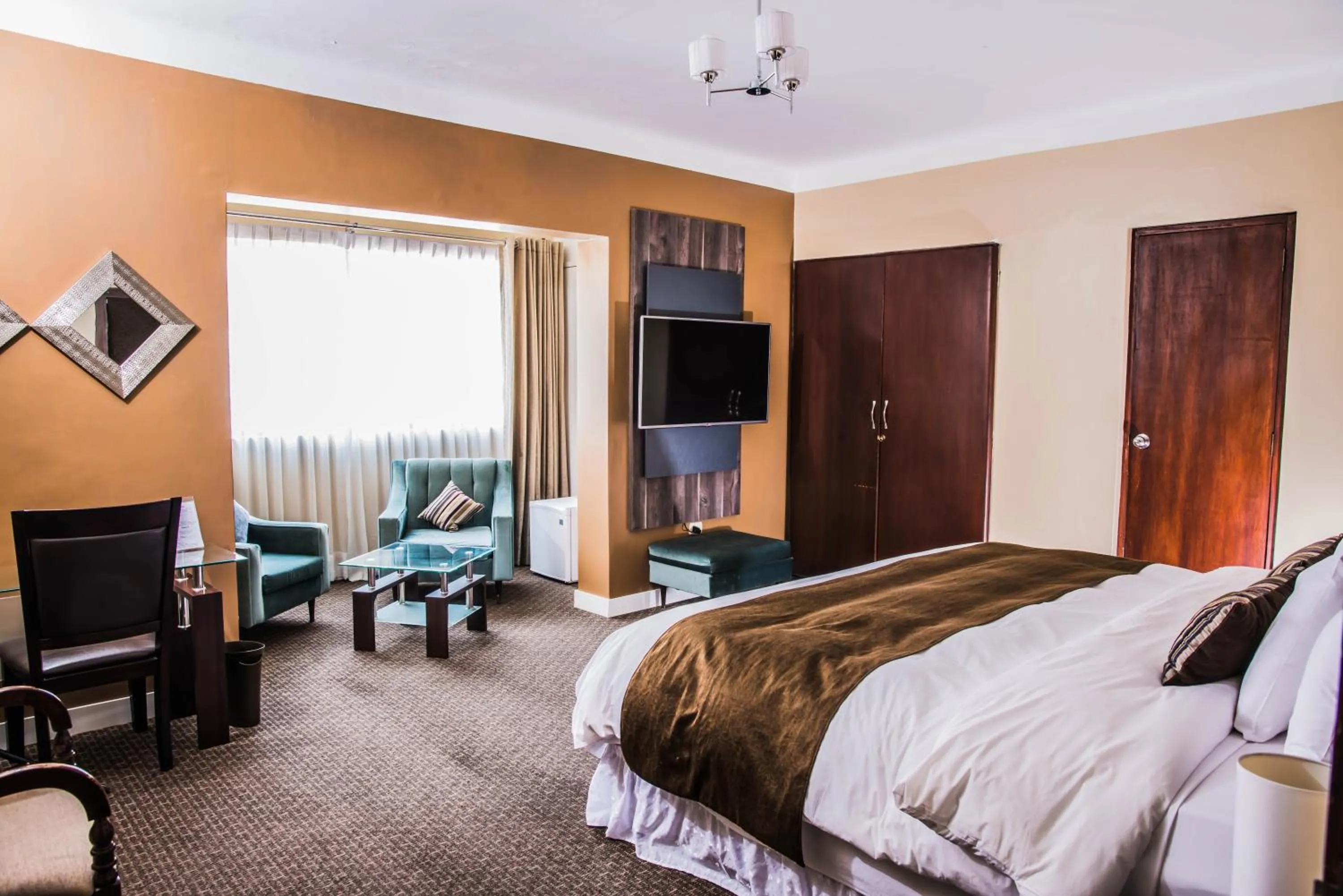 Bed in Los Leones Hotel Boutique