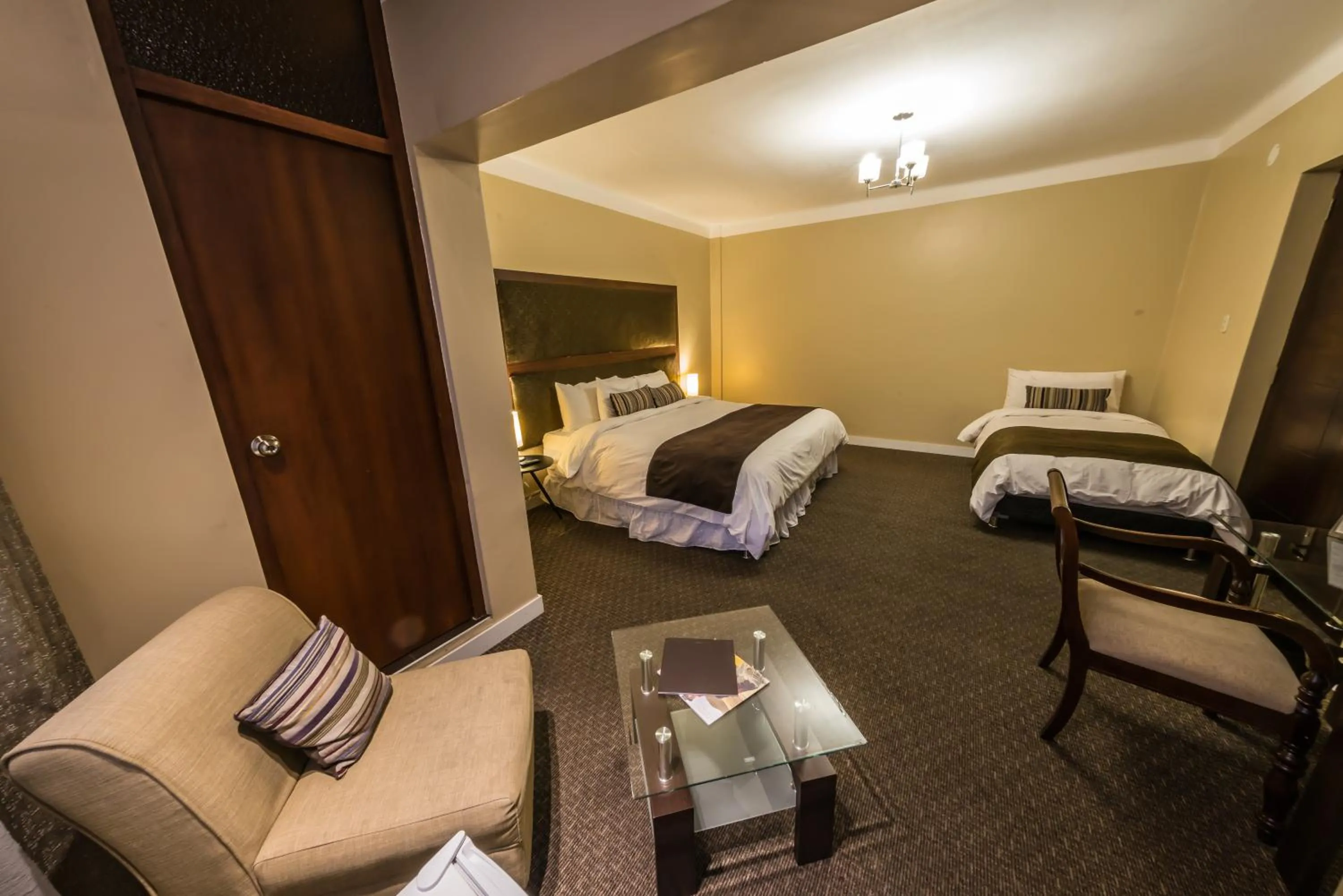 Bed in Los Leones Hotel Boutique