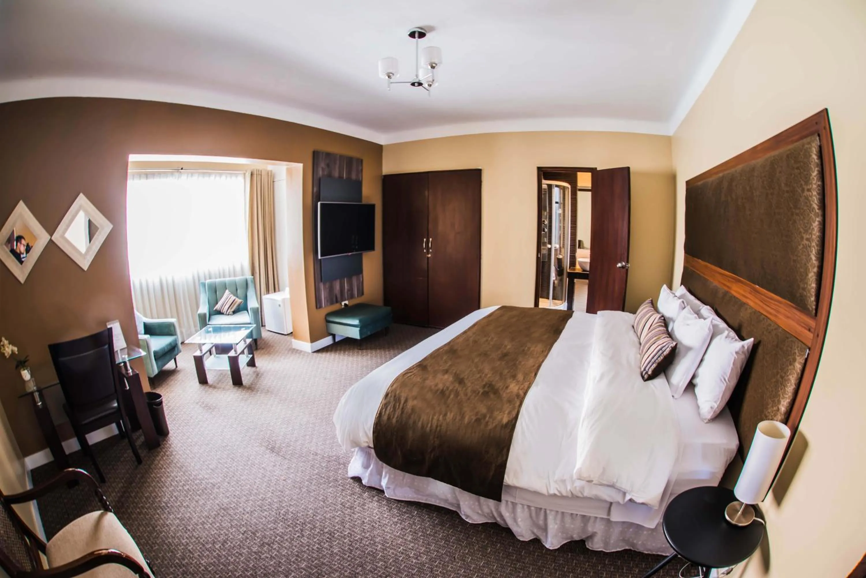 Bed in Los Leones Hotel Boutique