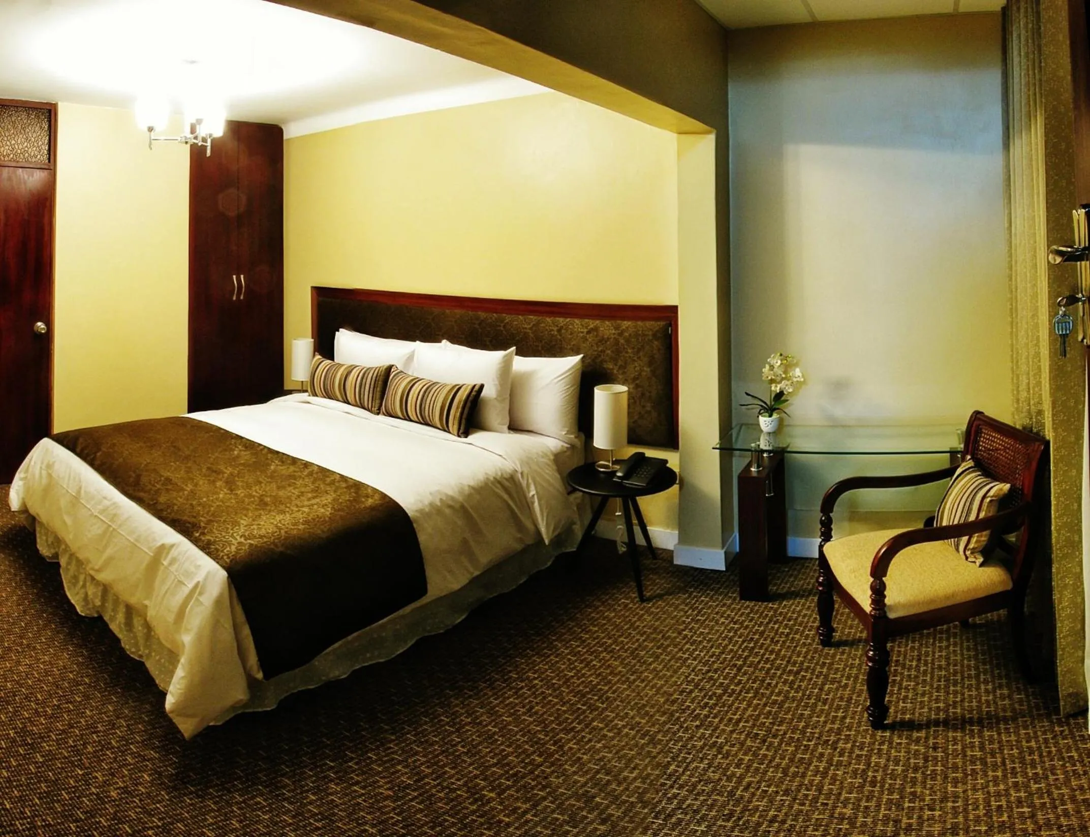 Bed in Los Leones Hotel Boutique