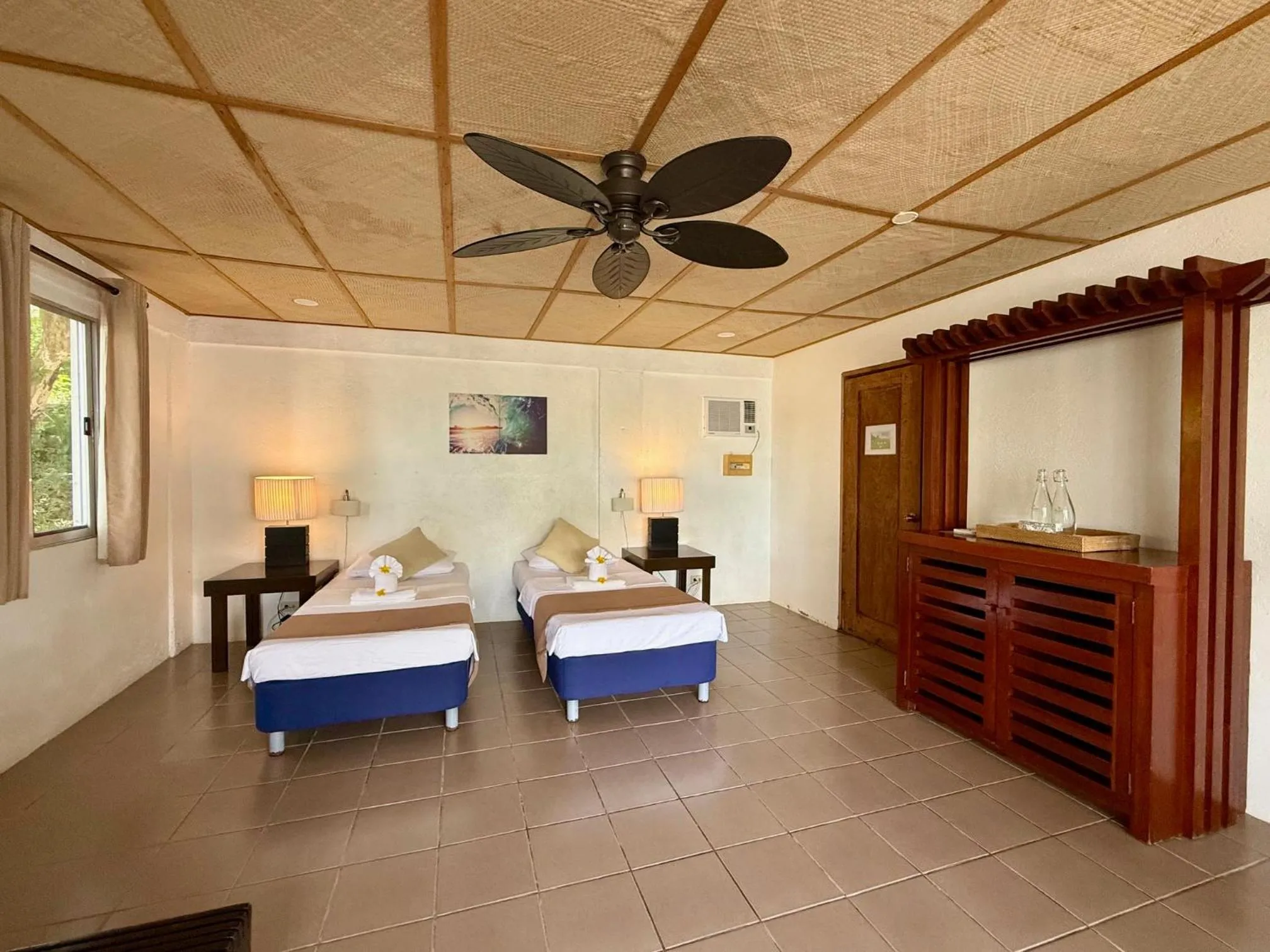 Bed in Chindonan Dive and Beach Resort