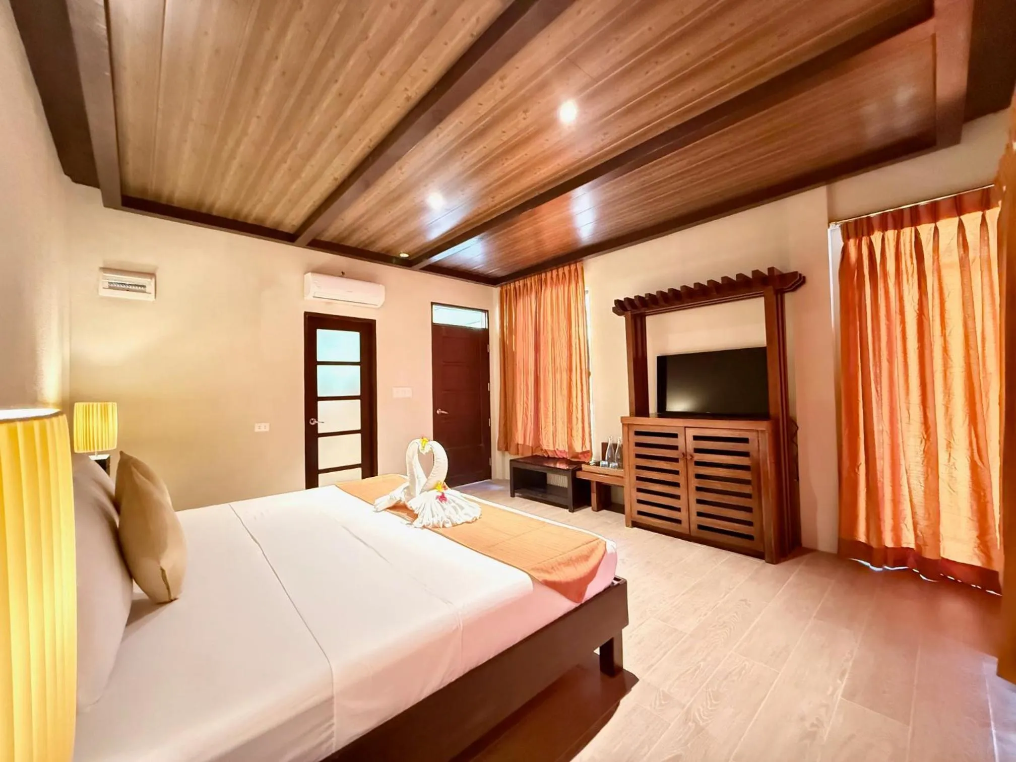 Bed in Chindonan Dive and Beach Resort
