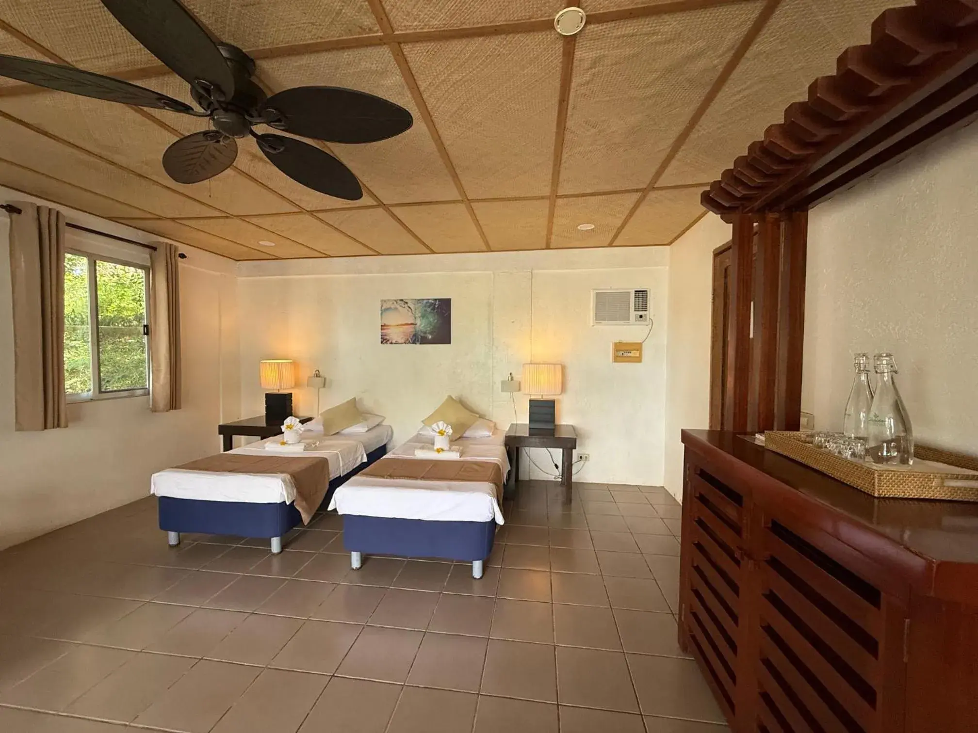 Bed in Chindonan Dive and Beach Resort Bed in Chindonan Dive and Beach Resort