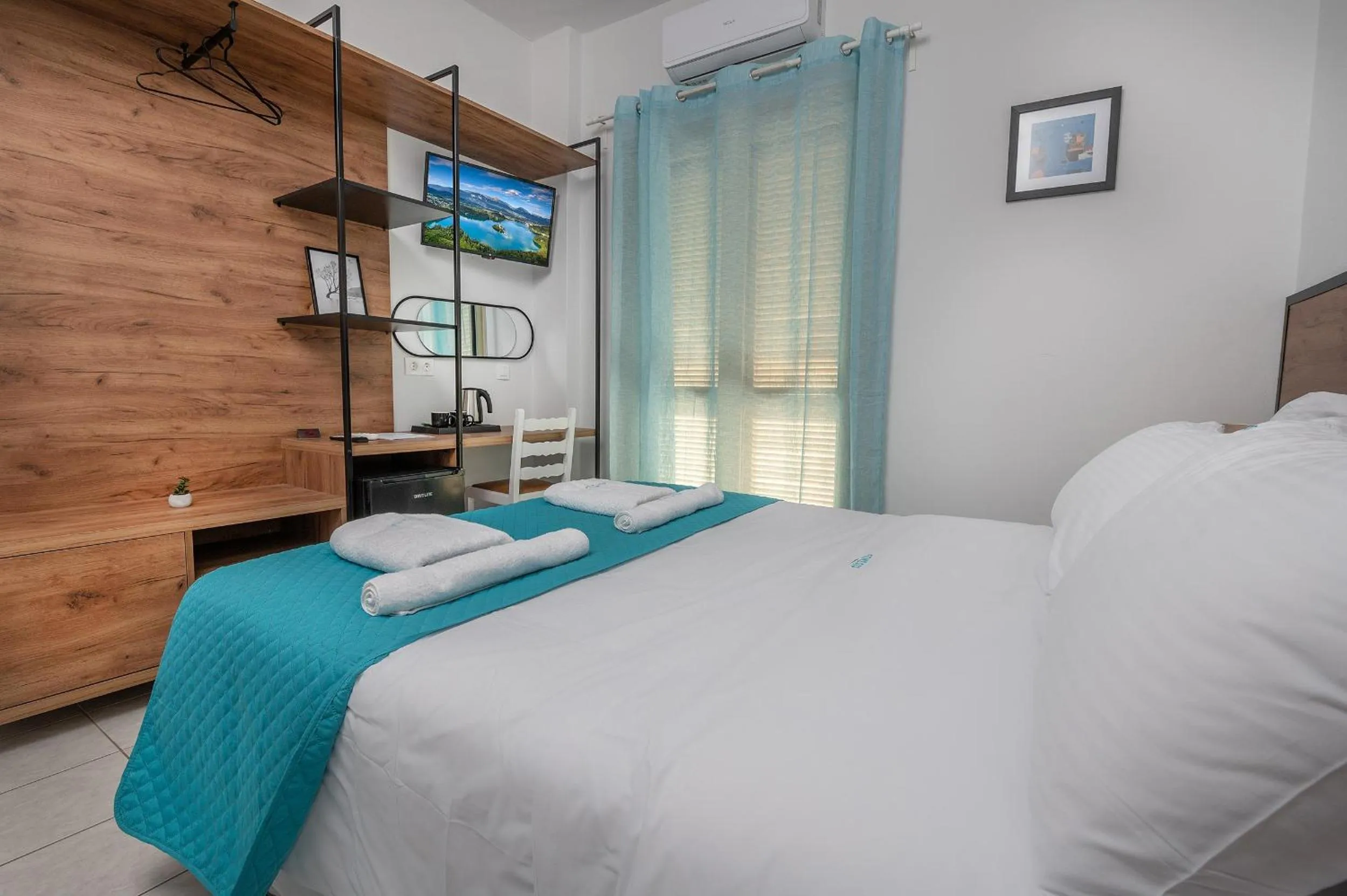 Bed in Genesis Hotel