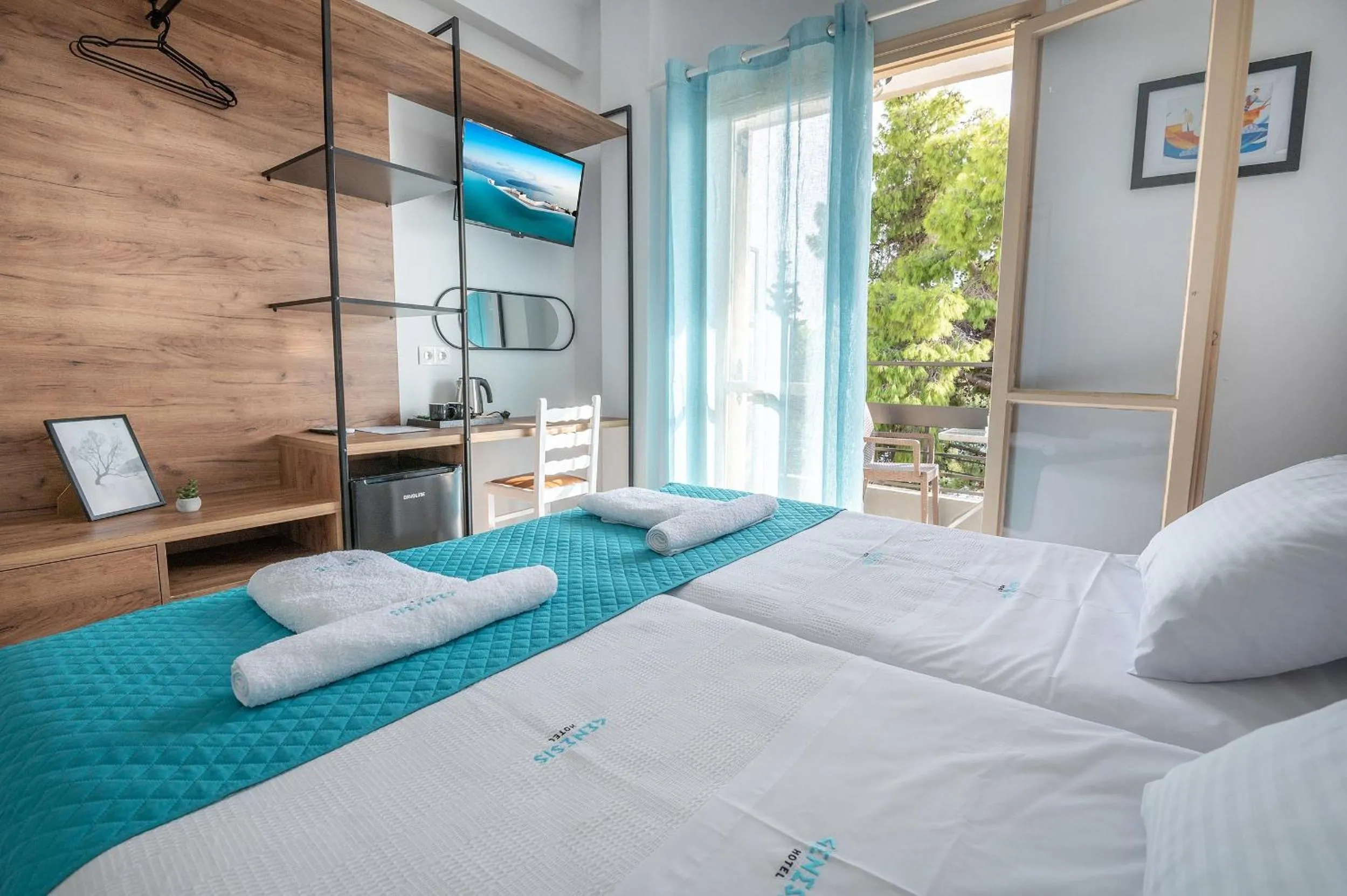 Bed in Genesis Hotel