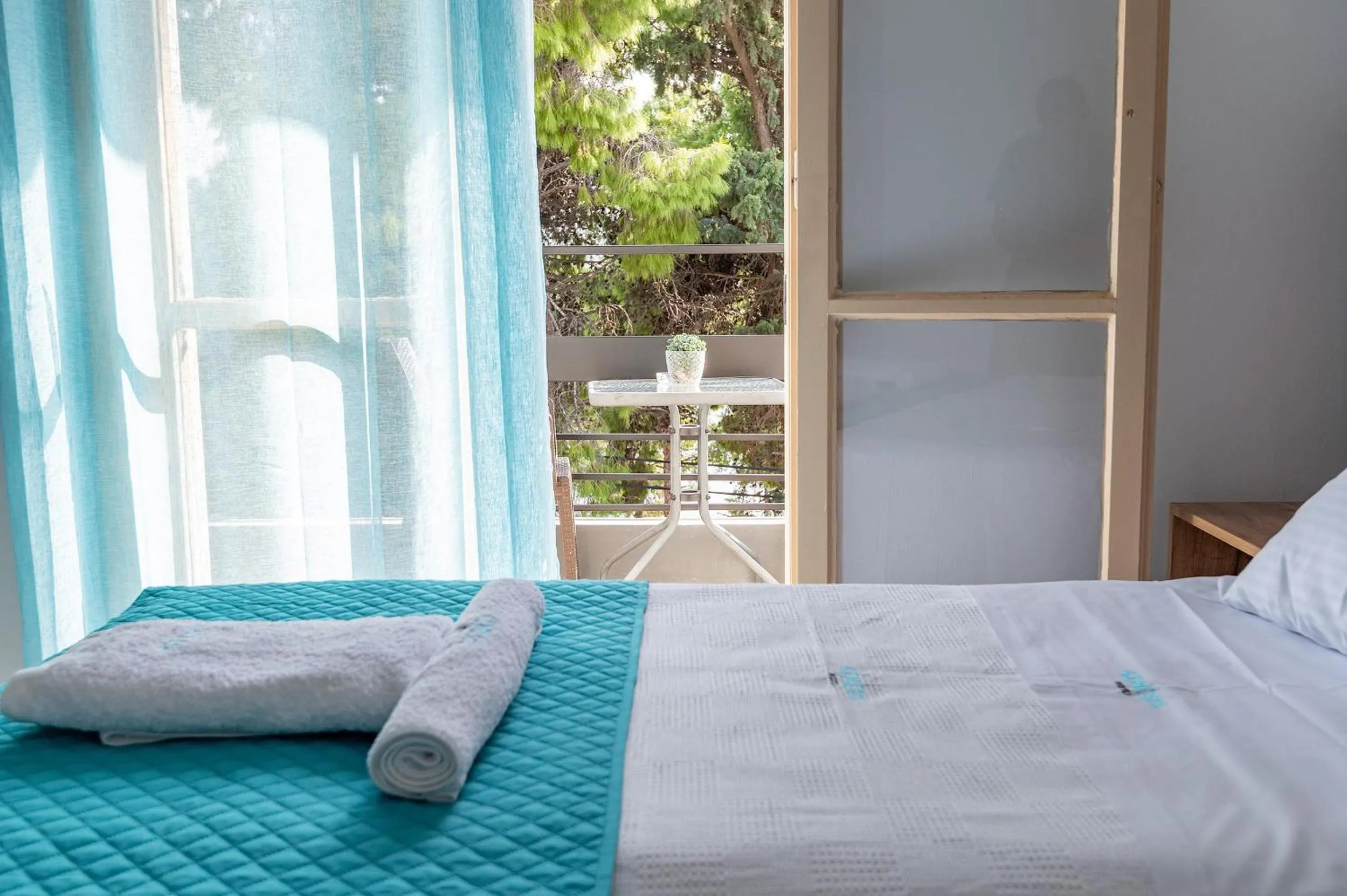 Bed in Genesis Hotel