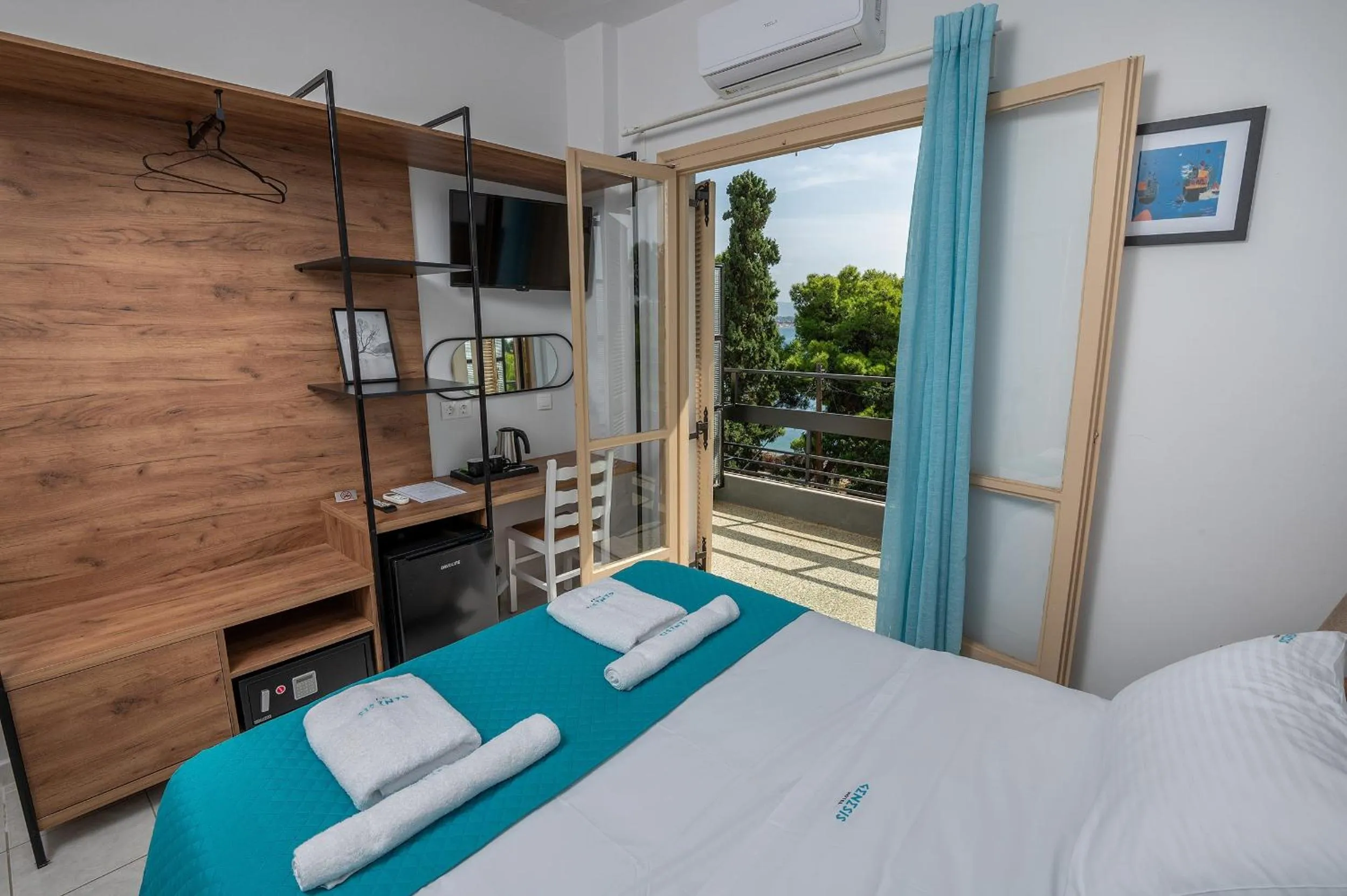 Bed in Genesis Hotel