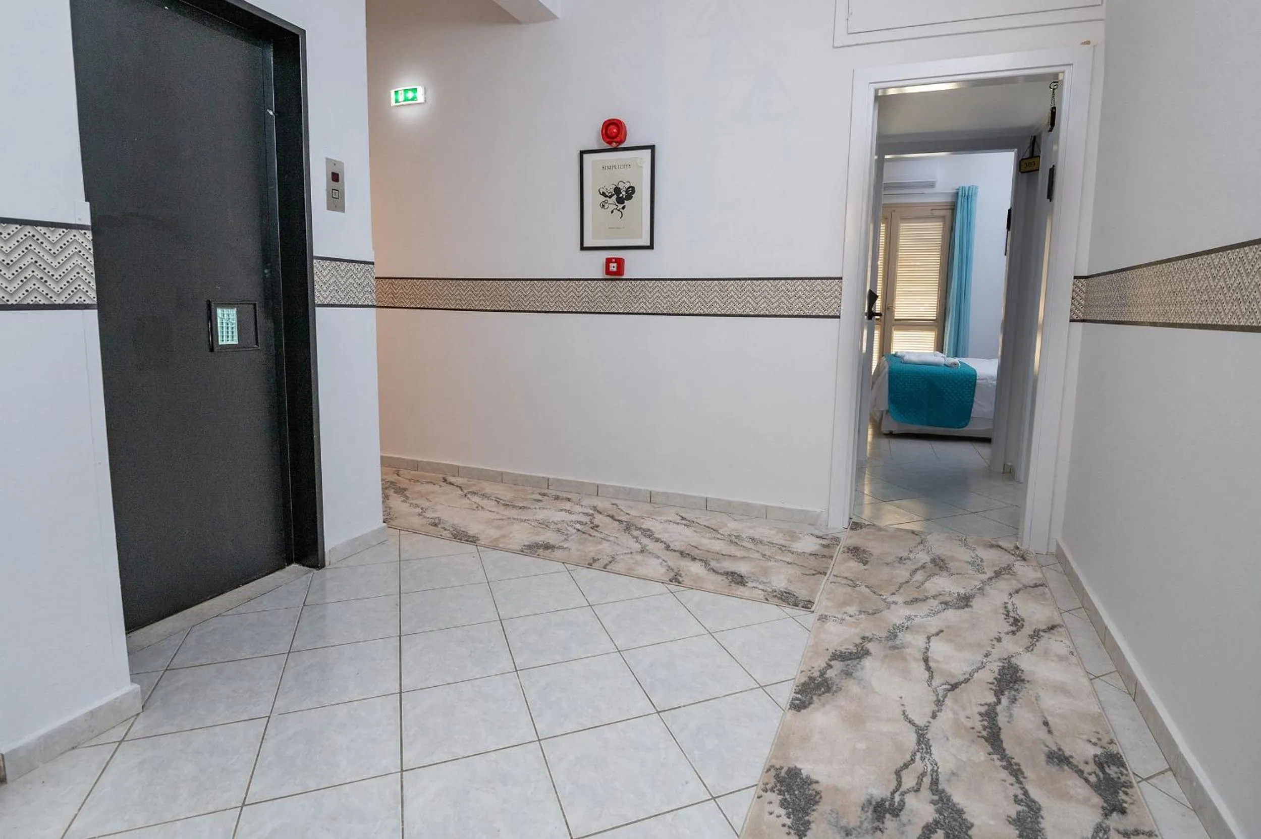 Bedroom in Genesis Hotel