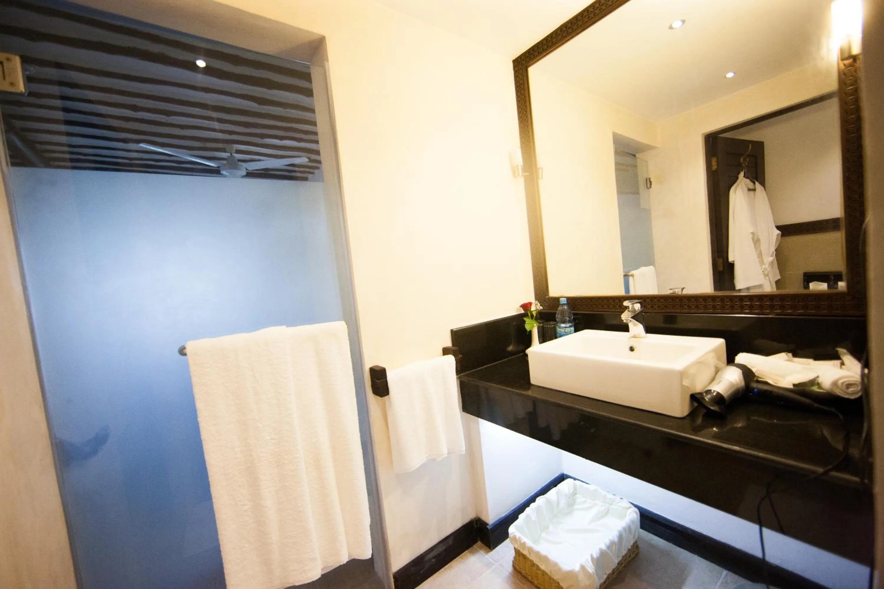 Bathroom, Bed in Jacaranda Indian Ocean Beach Resort