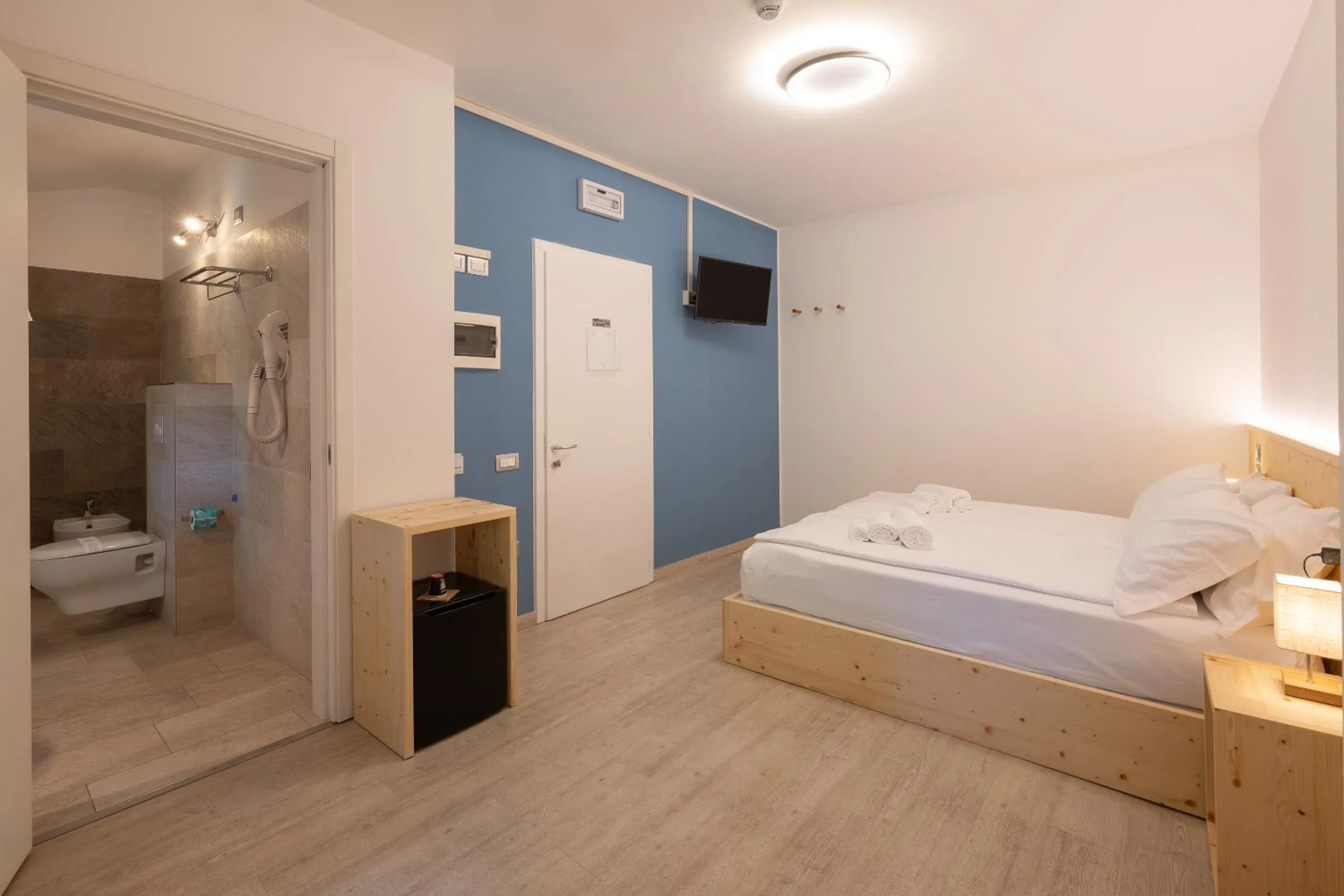 Toilet, Bed in Comune Rustico Sport Hotel