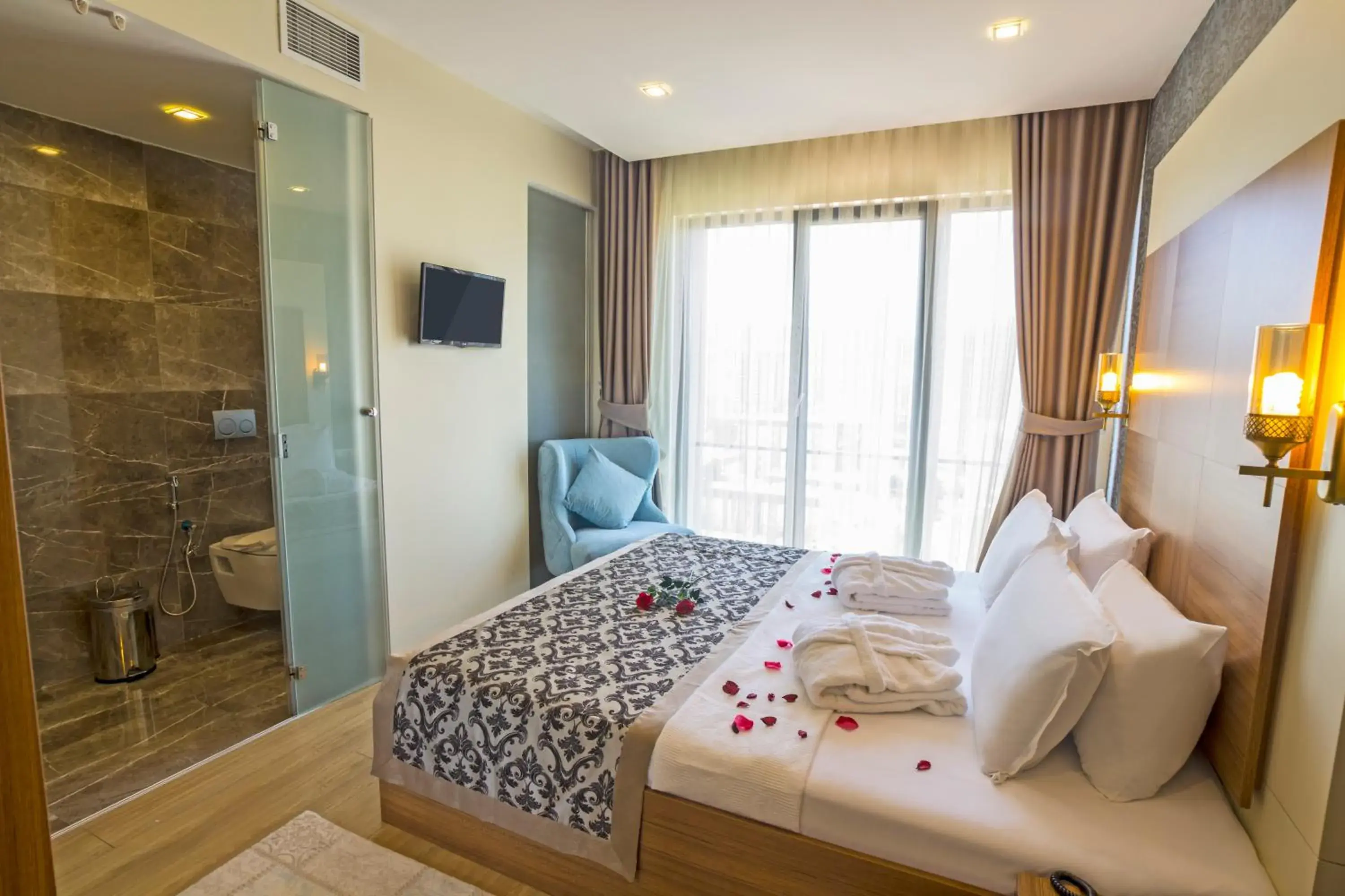 Bed in Alesha Suite Otel Bed in Alesha Suite Otel