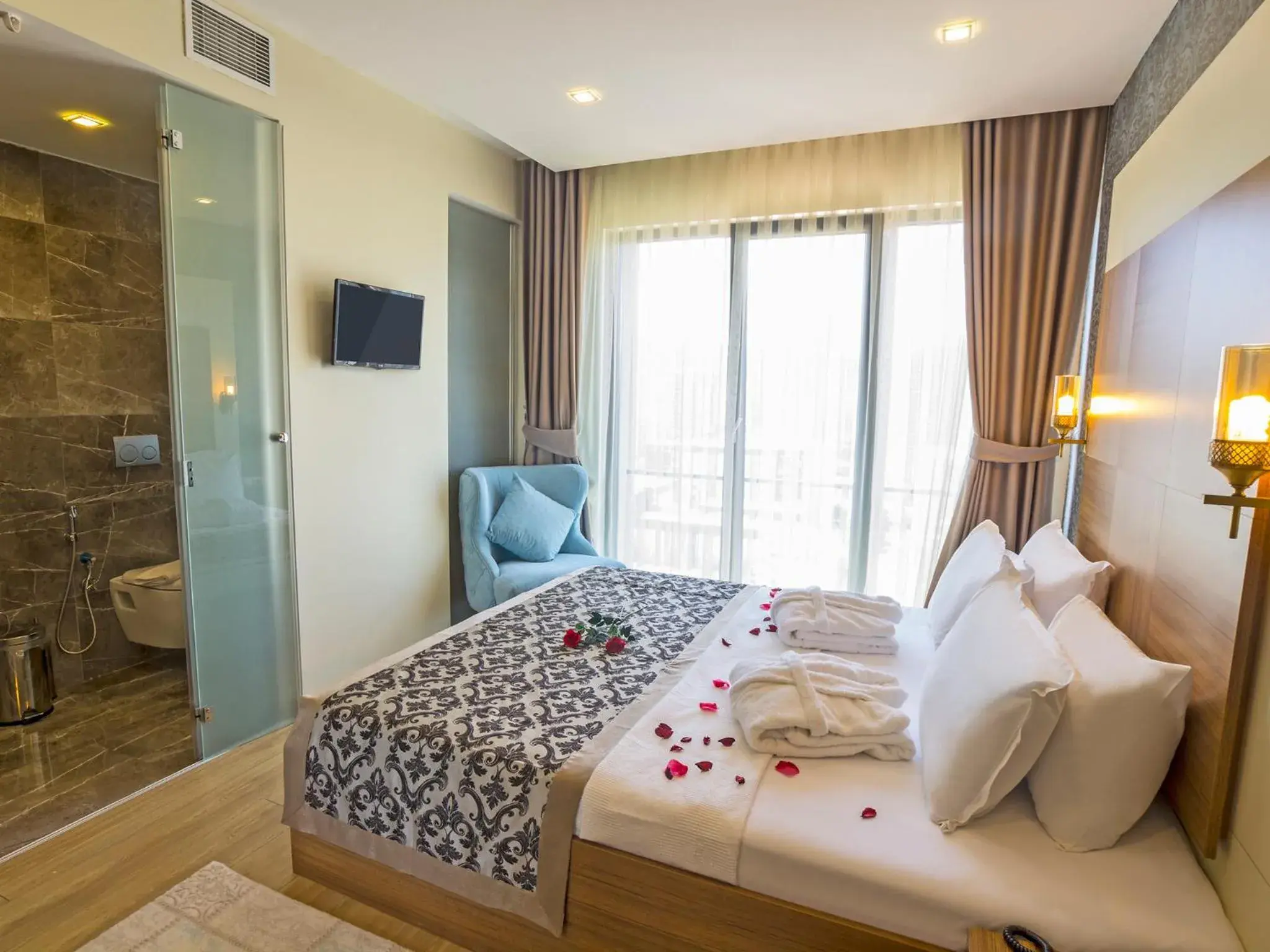 Bed in Alesha Suite Otel Bed in Alesha Suite Otel