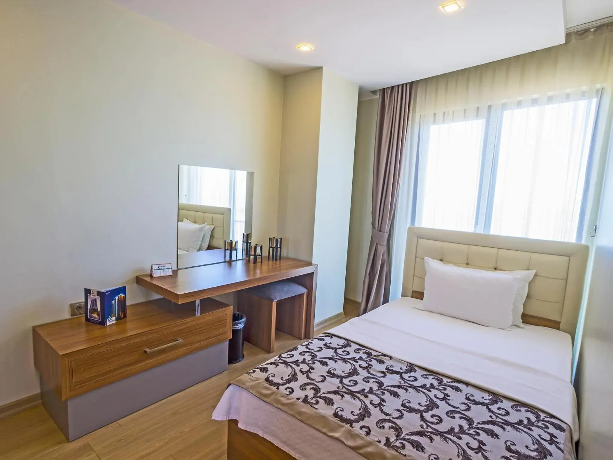 Bed in Alesha Suite Otel Bed in Alesha Suite Otel