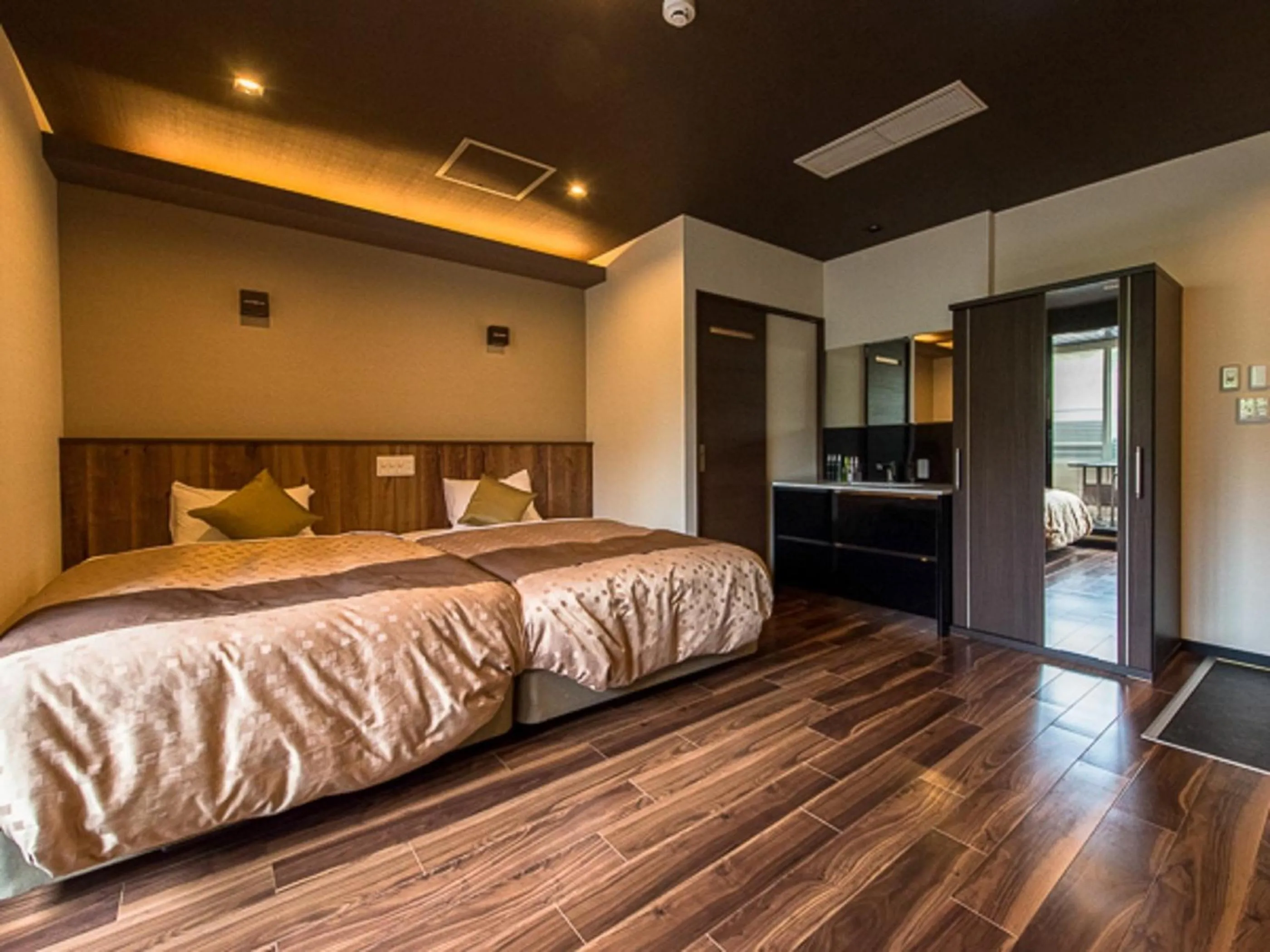 Bed in LiVEMAX RESORT Kaga Yamashiro