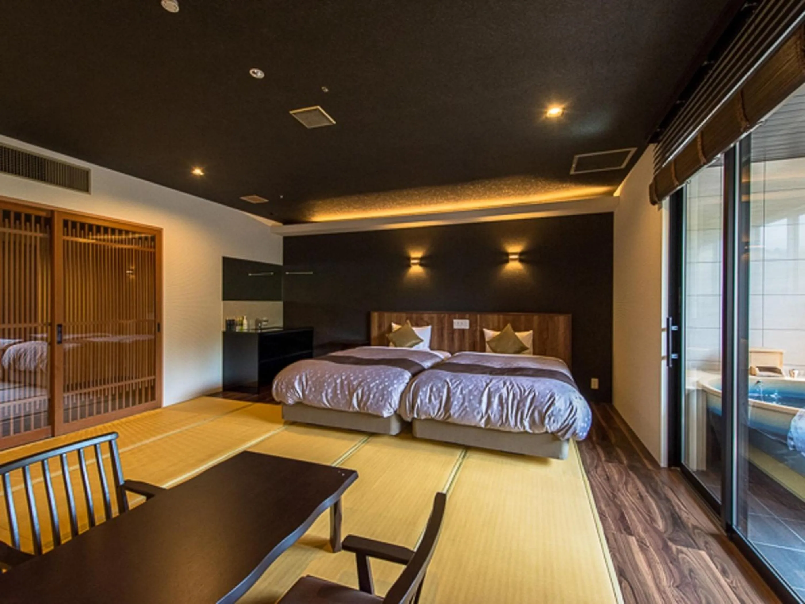 Bed in LiVEMAX RESORT Kaga Yamashiro