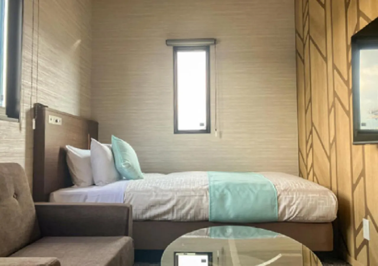 Bed in LiVEMAX RESORT Kaga Yamashiro