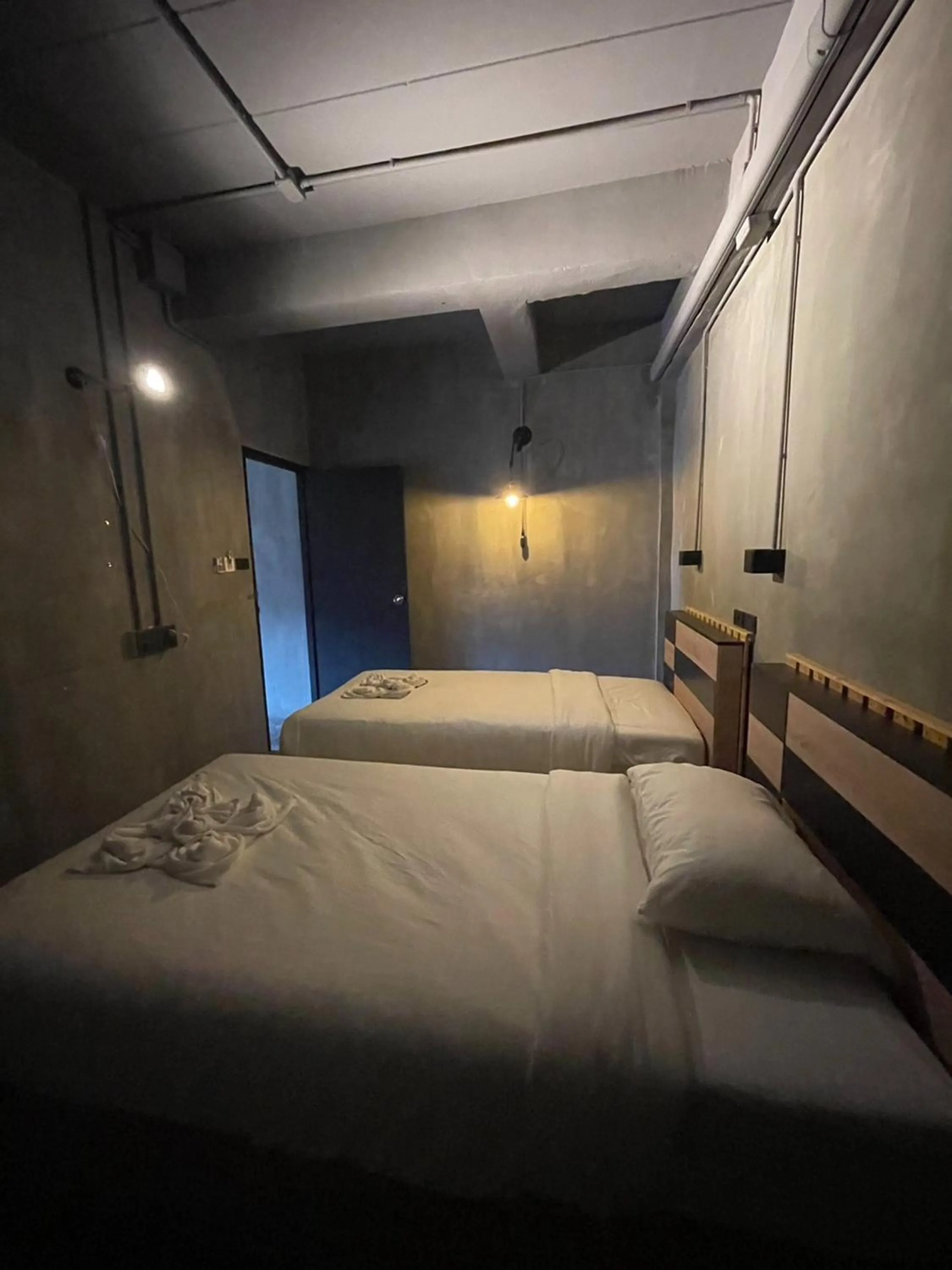 Bed in Sukhum Rajamangala-Phatthanakan Rooms