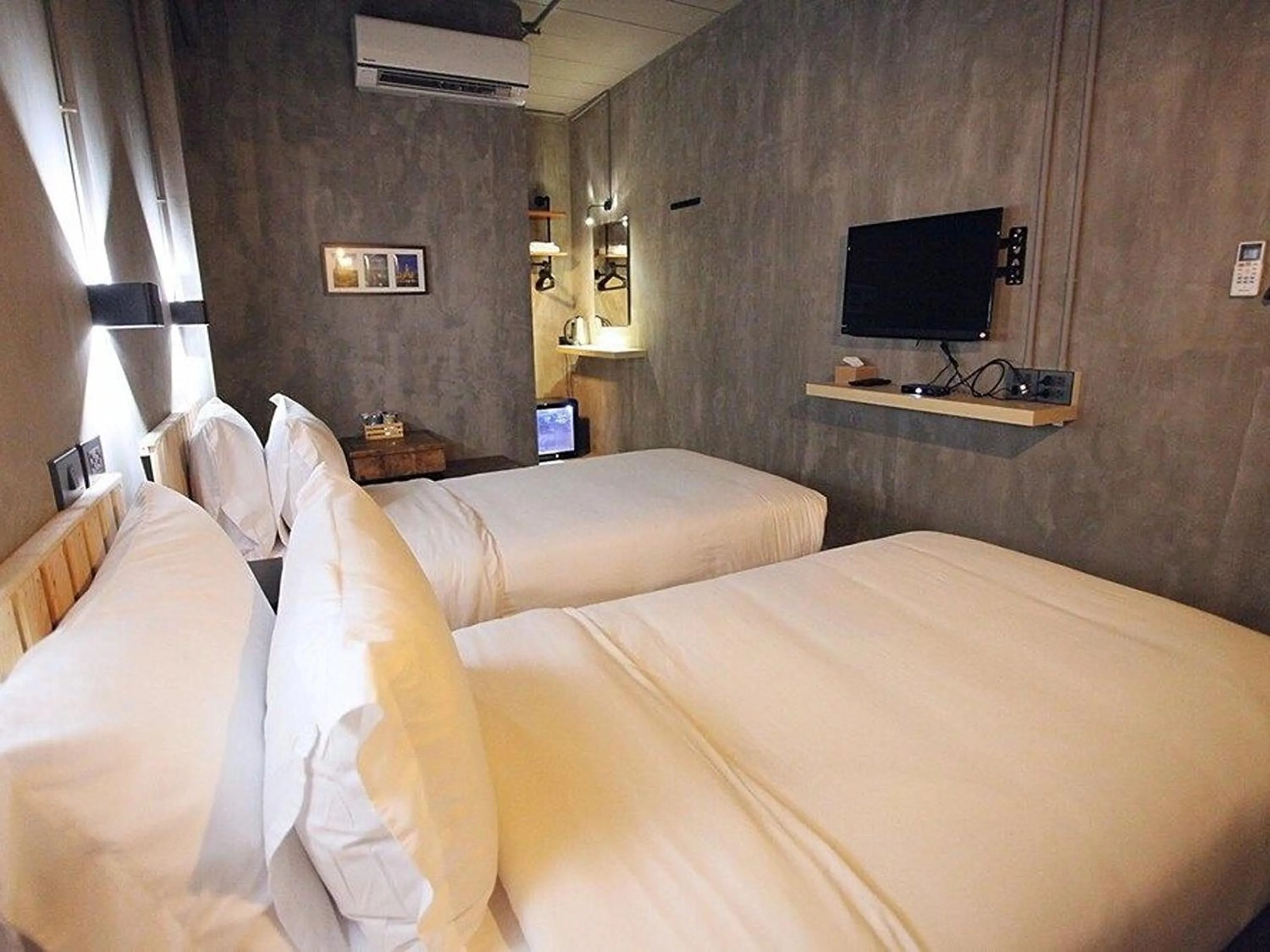 Bed in Sukhum Rajamangala-Phatthanakan Rooms