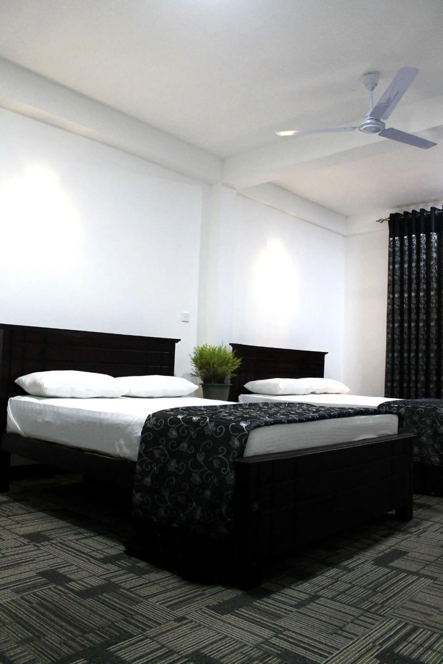 Photo of the whole room, Bed in Ella Rock Land
