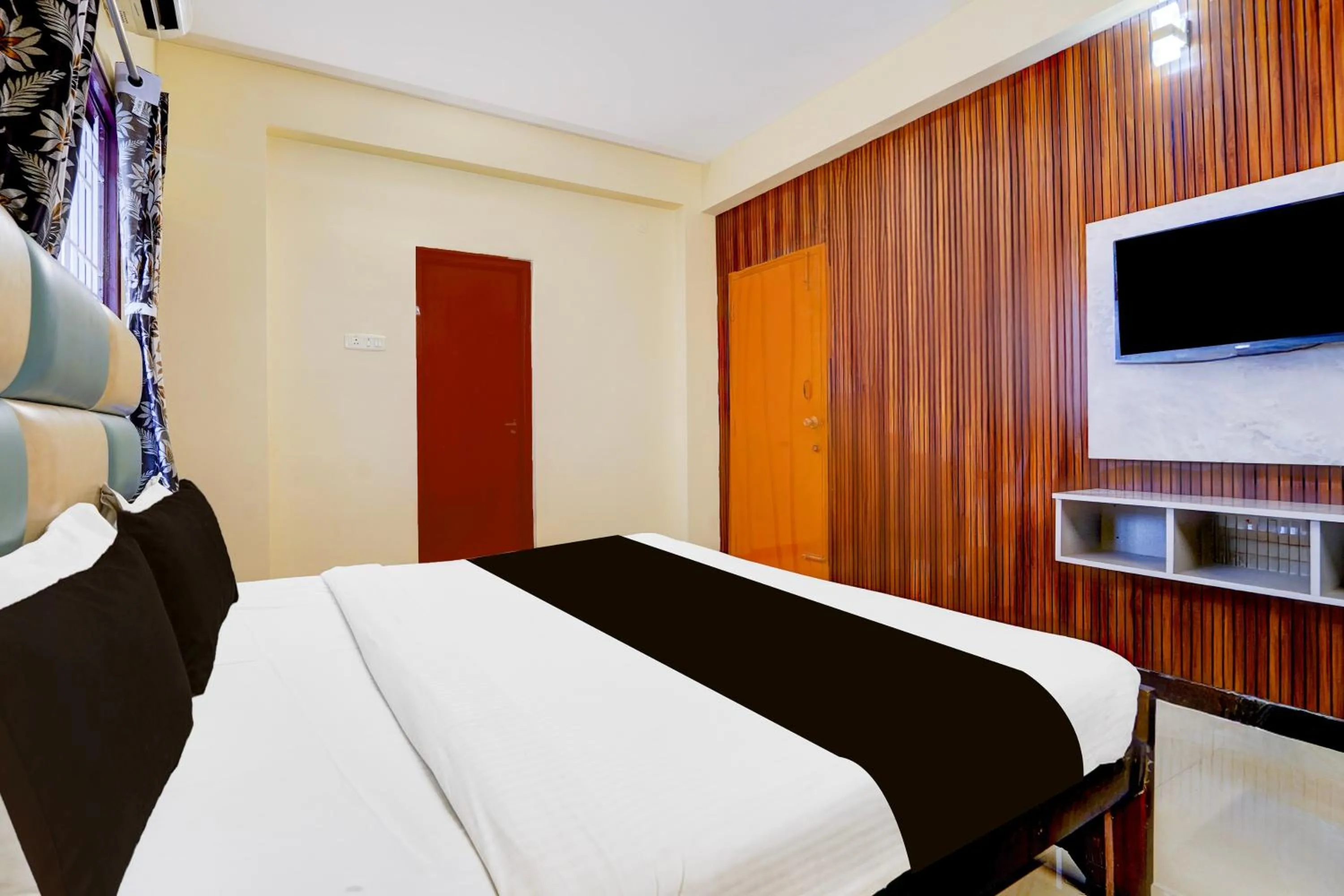 Bedroom in Hotel O Singanallur Railway Junction Formerly 2D Residency