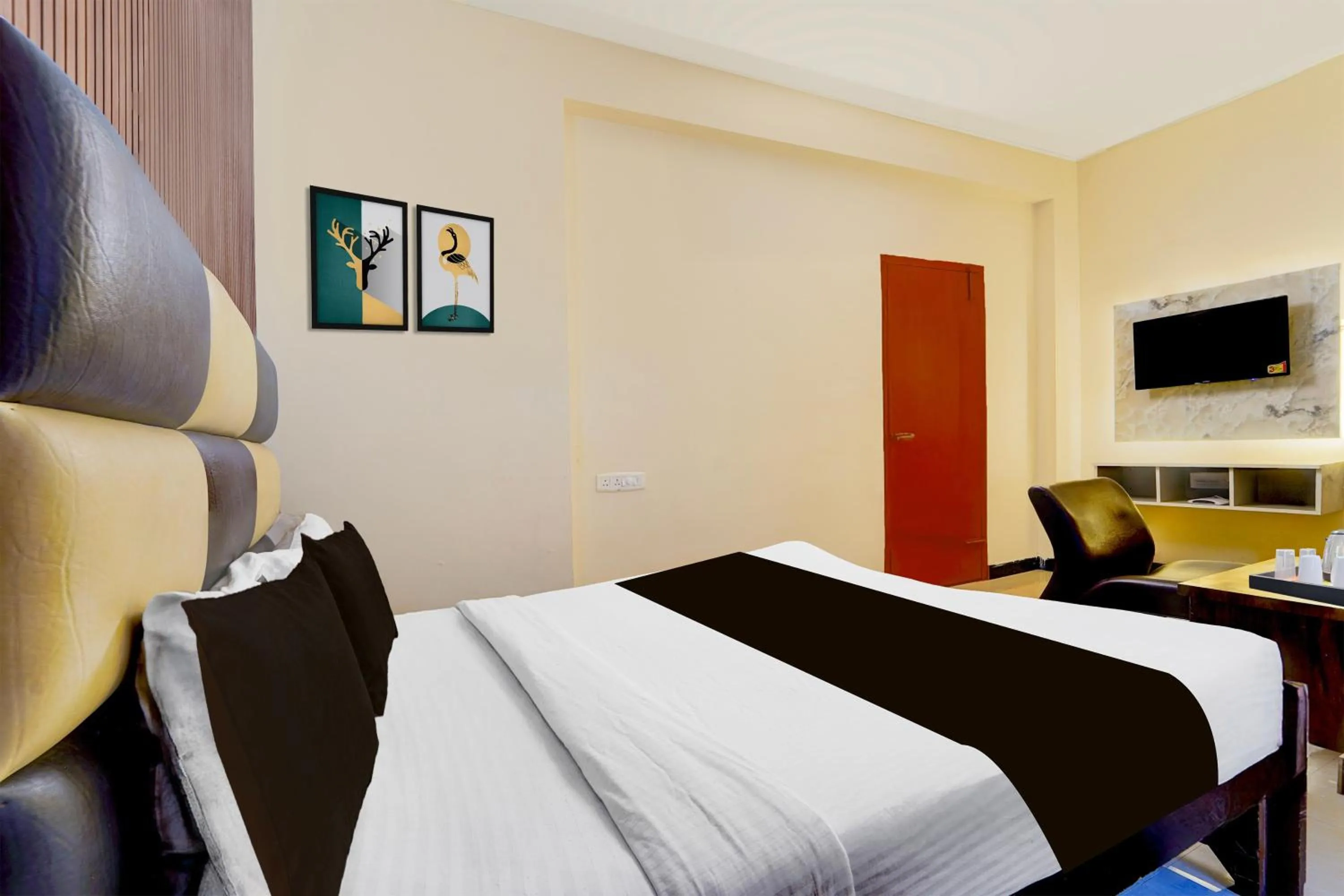 Bedroom in Hotel O Singanallur Railway Junction Formerly 2D Residency