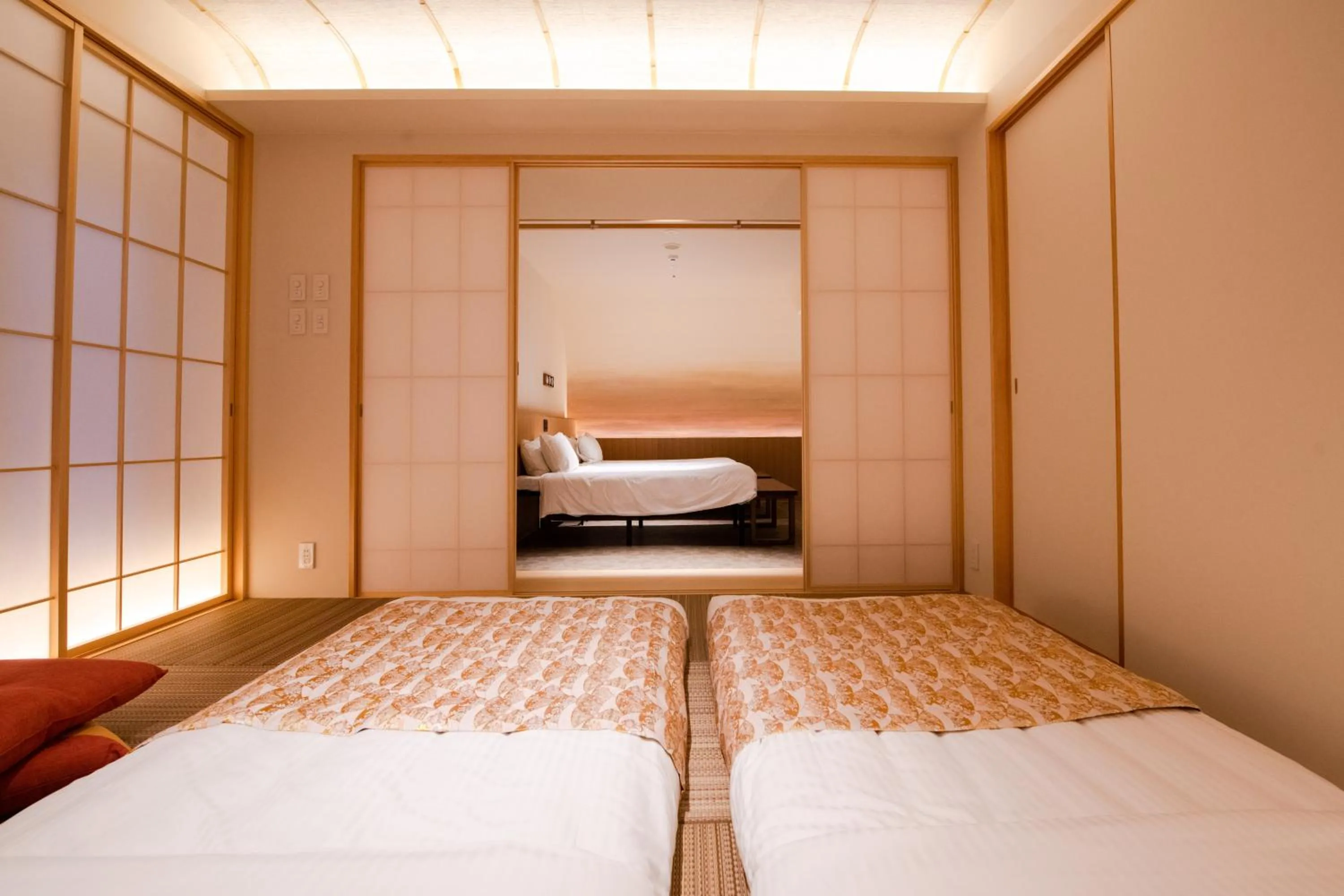 Bed in GuestHouse MIYABI Premium