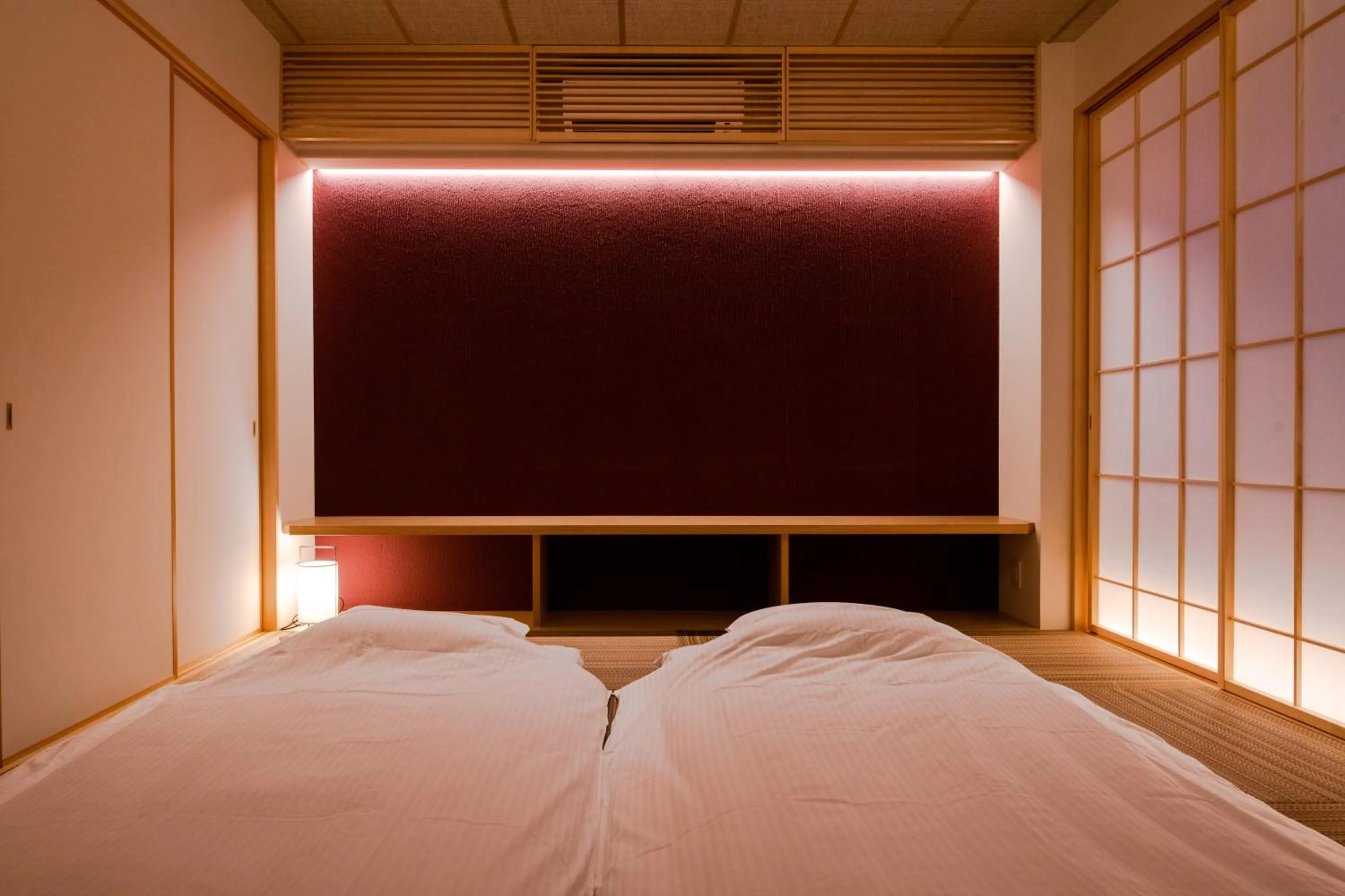 Bed in GuestHouse MIYABI Premium