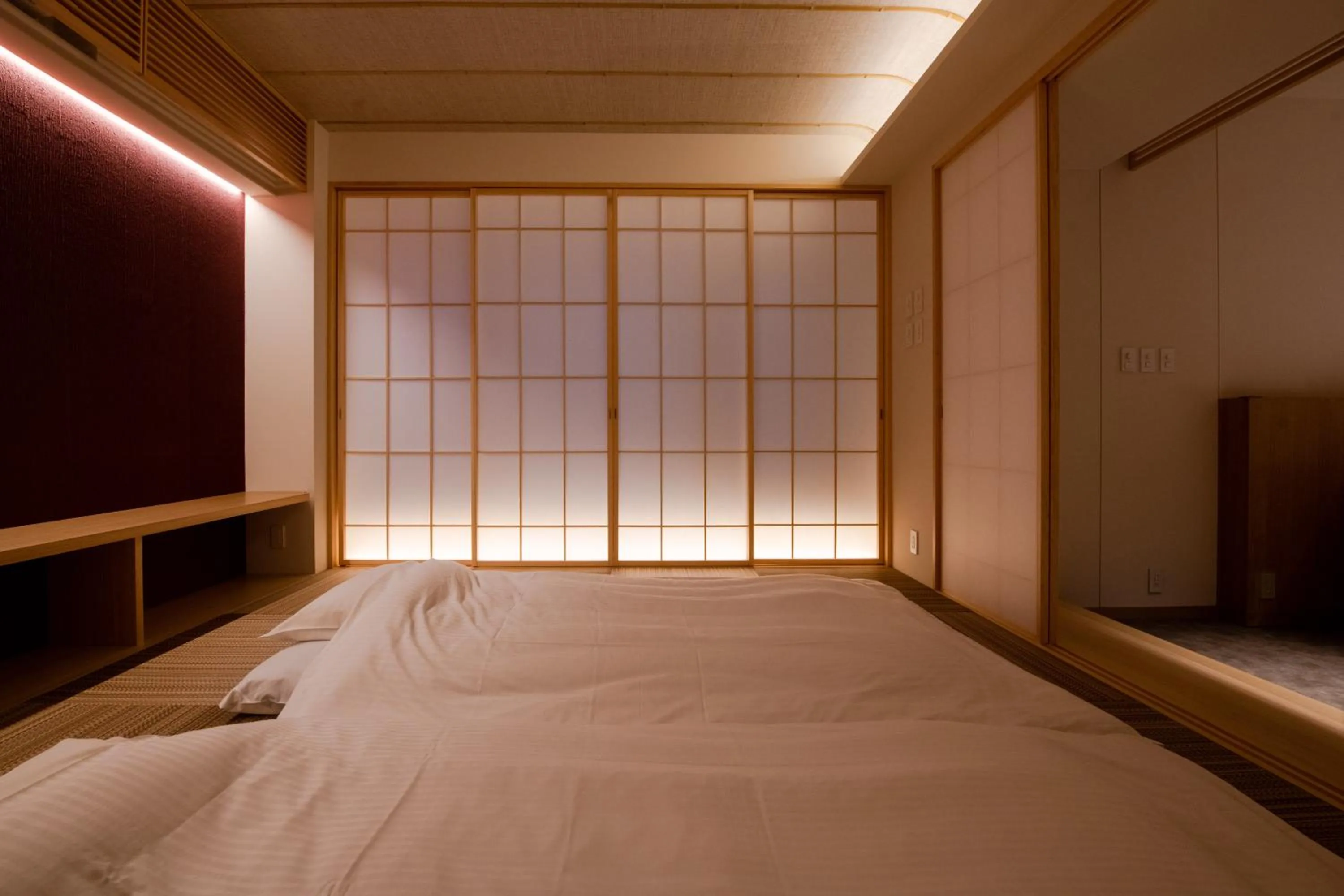 Bed in GuestHouse MIYABI Premium