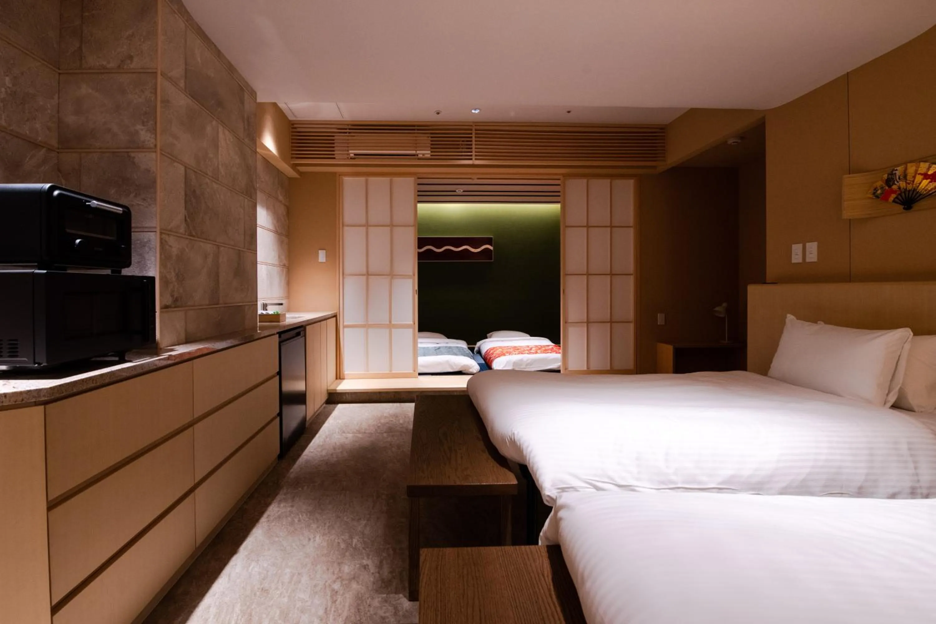 Bed in GuestHouse MIYABI Premium