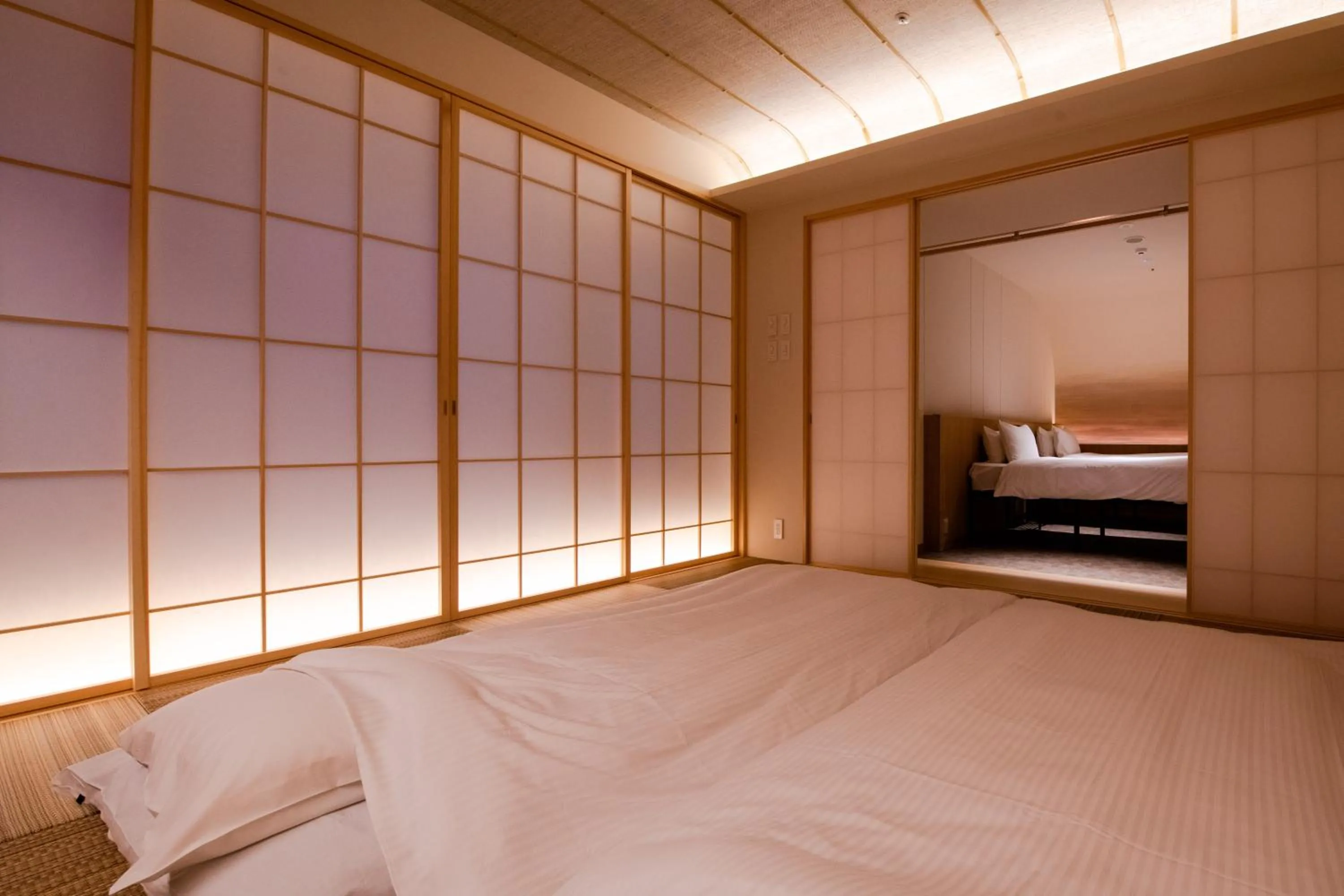 Bed in GuestHouse MIYABI Premium